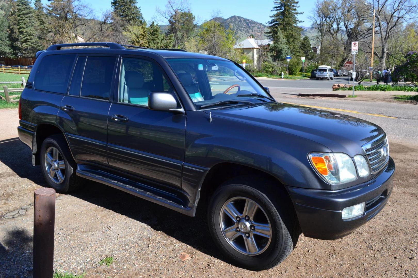 2006 Gray /Gray Lexus LX 470 Sport Utility (JTJHT00W464) with an 4.7L V8 DOHC 32V engine, 5-Speed Automatic Overdrive transmission, located at 2510 47th St. Suite 200, Boulder, CO, 80301, (303) 641-0333, 40.026196, -105.243217 - This Great One Owner, Low Mile, Non Smoker Female Driven LX470 is a New Lexus Trade in Recently Acquired by Boulder Motors of Boulder Colorado. It is Finished in Lexus Galactic Gray Mica with Gray Interior. A Flawless CarFax and AutoCheck Showing No Accidents, Odometer or Problems Reported EVER acc - Photo#12