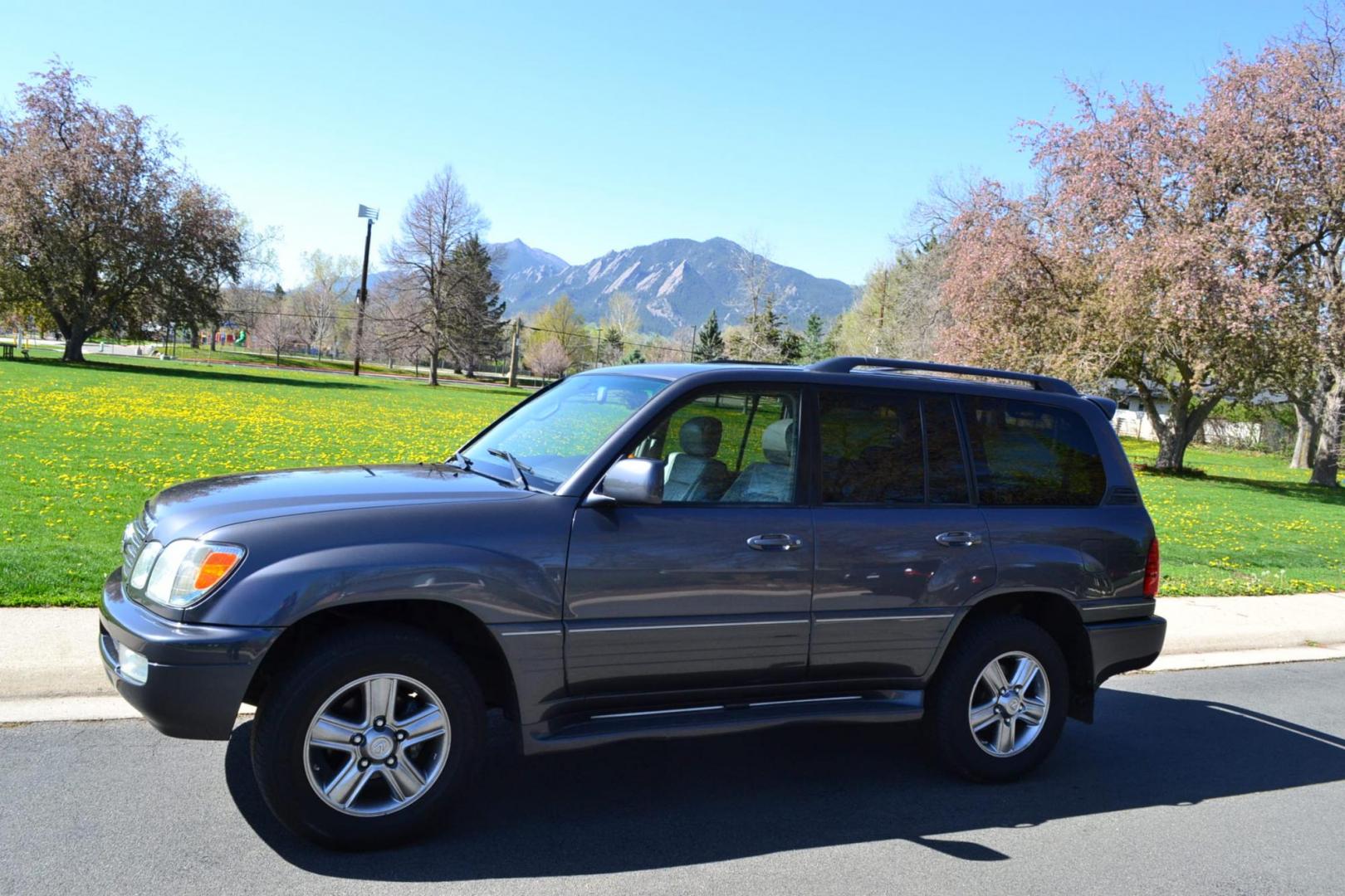 2006 Gray /Gray Lexus LX 470 Sport Utility (JTJHT00W464) with an 4.7L V8 DOHC 32V engine, 5-Speed Automatic Overdrive transmission, located at 2510 47th St. Suite 200, Boulder, CO, 80301, (303) 641-0333, 40.026196, -105.243217 - This Great One Owner, Low Mile, Non Smoker Female Driven LX470 is a New Lexus Trade in Recently Acquired by Boulder Motors of Boulder Colorado. It is Finished in Lexus Galactic Gray Mica with Gray Interior. A Flawless CarFax and AutoCheck Showing No Accidents, Odometer or Problems Reported EVER acc - Photo#18