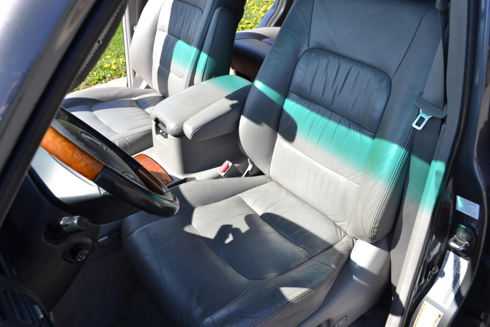 2006 Gray /Gray Lexus LX 470 Sport Utility (JTJHT00W464) with an 4.7L V8 DOHC 32V engine, 5-Speed Automatic Overdrive transmission, located at 2510 47th St. Suite 200, Boulder, CO, 80301, (303) 641-0333, 40.026196, -105.243217 - This Great One Owner, Low Mile, Non Smoker Female Driven LX470 is a New Lexus Trade in Recently Acquired by Boulder Motors of Boulder Colorado. It is Finished in Lexus Galactic Gray Mica with Gray Interior. A Flawless CarFax and AutoCheck Showing No Accidents, Odometer or Problems Reported EVER acc - Photo#21