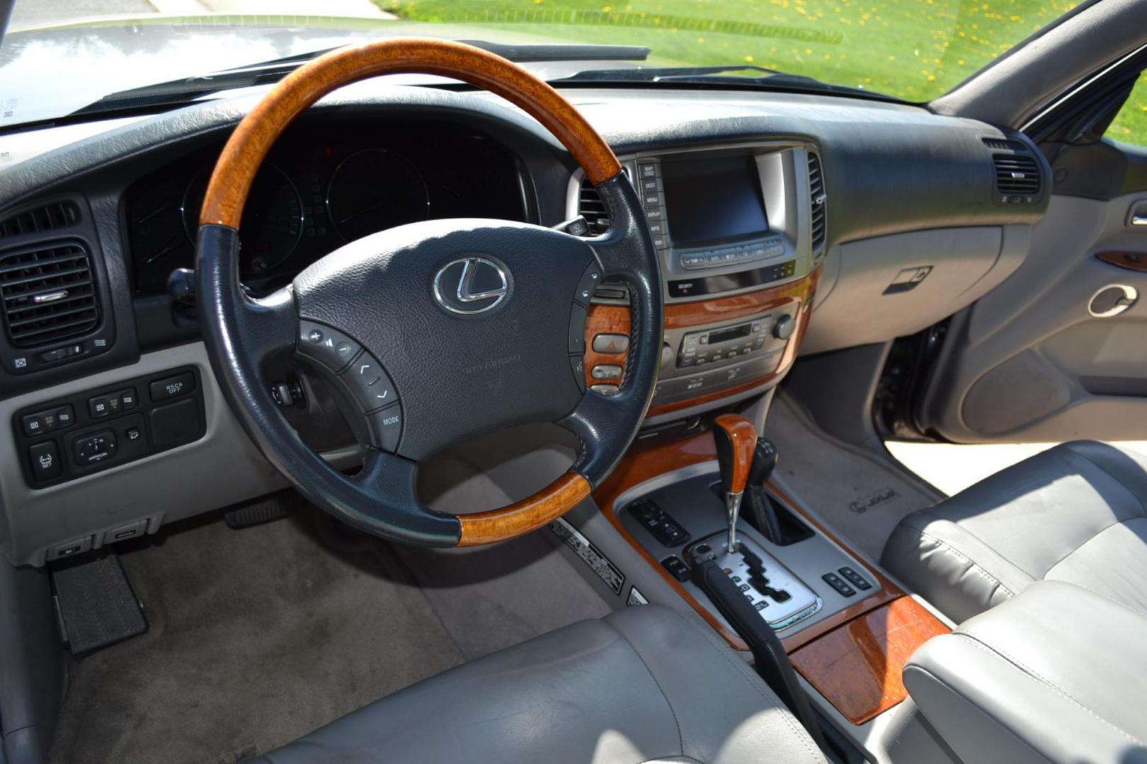 2006 Gray /Gray Lexus LX 470 Sport Utility (JTJHT00W464) with an 4.7L V8 DOHC 32V engine, 5-Speed Automatic Overdrive transmission, located at 2510 47th St. Suite 200, Boulder, CO, 80301, (303) 641-0333, 40.026196, -105.243217 - This Great One Owner, Low Mile, Non Smoker Female Driven LX470 is a New Lexus Trade in Recently Acquired by Boulder Motors of Boulder Colorado. It is Finished in Lexus Galactic Gray Mica with Gray Interior. A Flawless CarFax and AutoCheck Showing No Accidents, Odometer or Problems Reported EVER acc - Photo#22