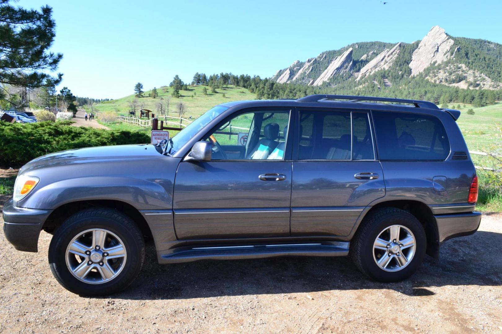 2006 Gray /Gray Lexus LX 470 Sport Utility (JTJHT00W464) with an 4.7L V8 DOHC 32V engine, 5-Speed Automatic Overdrive transmission, located at 2510 47th St. Suite 200, Boulder, CO, 80301, (303) 641-0333, 40.026196, -105.243217 - This Great One Owner, Low Mile, Non Smoker Female Driven LX470 is a New Lexus Trade in Recently Acquired by Boulder Motors of Boulder Colorado. It is Finished in Lexus Galactic Gray Mica with Gray Interior. A Flawless CarFax and AutoCheck Showing No Accidents, Odometer or Problems Reported EVER acc - Photo#4