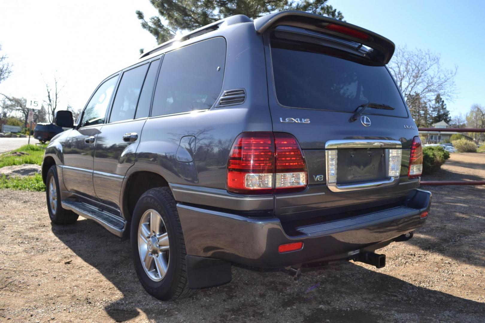 2006 Gray /Gray Lexus LX 470 Sport Utility (JTJHT00W464) with an 4.7L V8 DOHC 32V engine, 5-Speed Automatic Overdrive transmission, located at 2510 47th St. Suite 200, Boulder, CO, 80301, (303) 641-0333, 40.026196, -105.243217 - This Great One Owner, Low Mile, Non Smoker Female Driven LX470 is a New Lexus Trade in Recently Acquired by Boulder Motors of Boulder Colorado. It is Finished in Lexus Galactic Gray Mica with Gray Interior. A Flawless CarFax and AutoCheck Showing No Accidents, Odometer or Problems Reported EVER acc - Photo#7