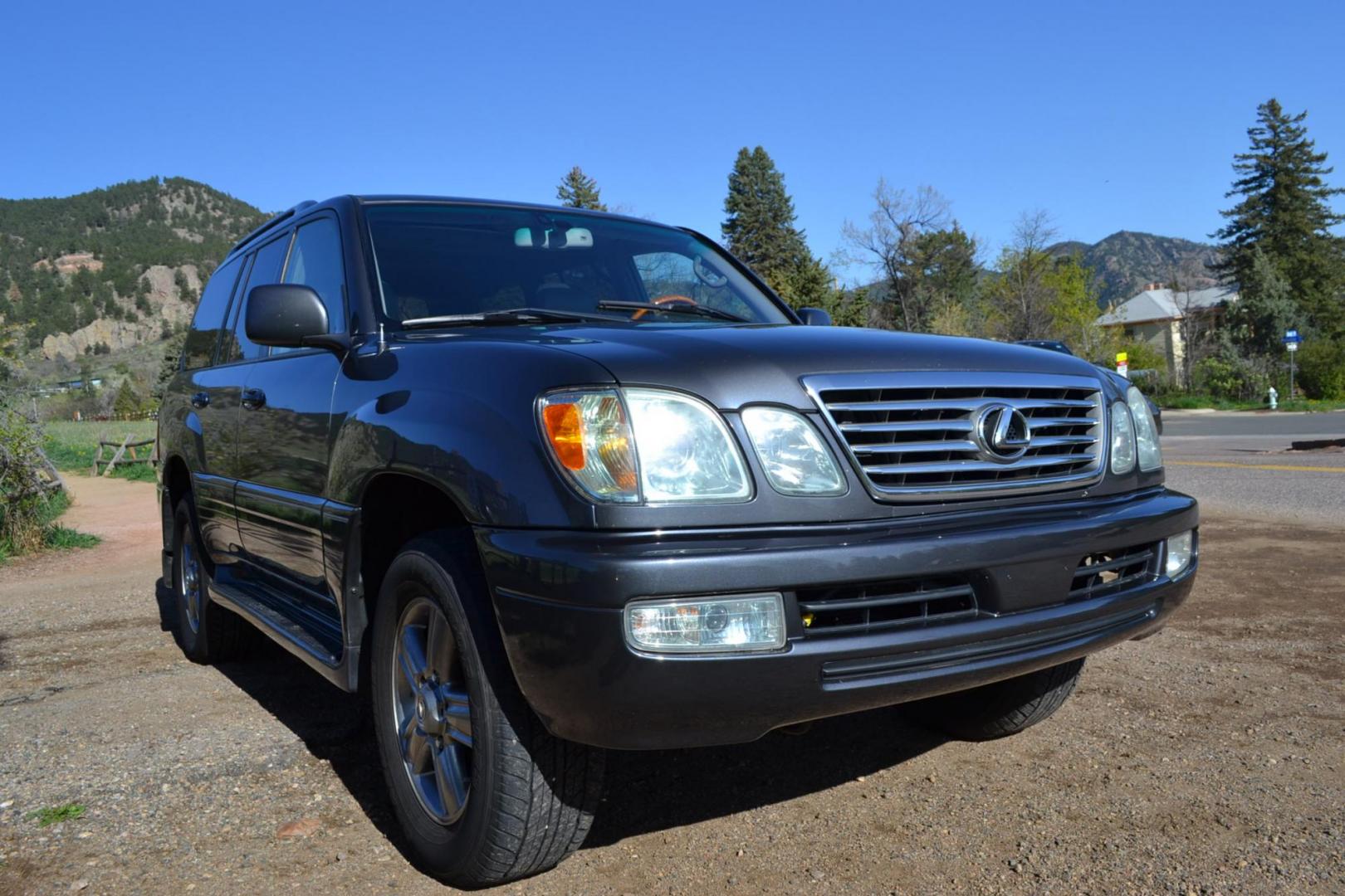 2006 Gray /Gray Lexus LX 470 Sport Utility (JTJHT00W464) with an 4.7L V8 DOHC 32V engine, 5-Speed Automatic Overdrive transmission, located at 2510 47th St. Suite 200, Boulder, CO, 80301, (303) 641-0333, 40.026196, -105.243217 - This Great One Owner, Low Mile, Non Smoker Female Driven LX470 is a New Lexus Trade in Recently Acquired by Boulder Motors of Boulder Colorado. It is Finished in Lexus Galactic Gray Mica with Gray Interior. A Flawless CarFax and AutoCheck Showing No Accidents, Odometer or Problems Reported EVER acc - Photo#9