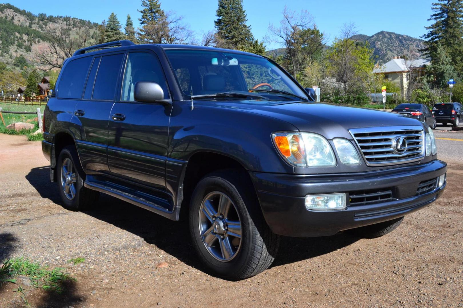2006 Gray /Gray Lexus LX 470 Sport Utility (JTJHT00W464) with an 4.7L V8 DOHC 32V engine, 5-Speed Automatic Overdrive transmission, located at 2510 47th St. Suite 200, Boulder, CO, 80301, (303) 641-0333, 40.026196, -105.243217 - This Great One Owner, Low Mile, Non Smoker Female Driven LX470 is a New Lexus Trade in Recently Acquired by Boulder Motors of Boulder Colorado. It is Finished in Lexus Galactic Gray Mica with Gray Interior. A Flawless CarFax and AutoCheck Showing No Accidents, Odometer or Problems Reported EVER acc - Photo#11