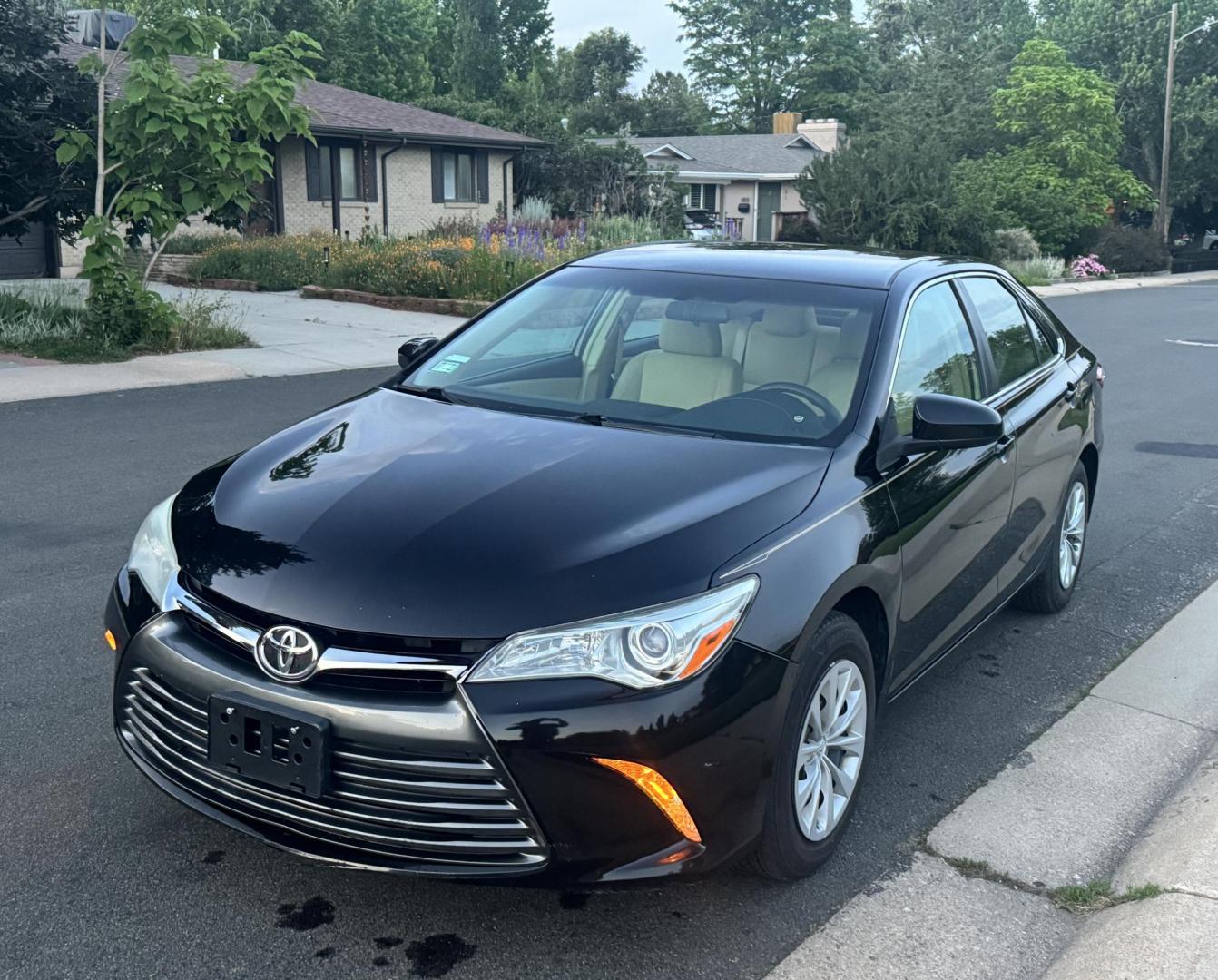 2016 Black /Tan Toyota Camry SE (4T1BF1FK2GU) with an 2.5L L4 DOHC 16V engine, 6-Speed Automatic transmission, located at 2510 47th St. Suite 200, Boulder, CO, 80301, (303) 641-0333, 40.026196, -105.243217 - This, Low Mile, Non-Smoker Camry is a new Acquisition by Boulder Motors, of Boulder Colorado. It is Finished in Toyota’s Midnight Black Metallic with Flaxen interior. It has clean CarFax and Autocheck showing No Odometer or Problems reported Ever. It has a Clean, Clear CO Title. Some of the ad - Photo#2