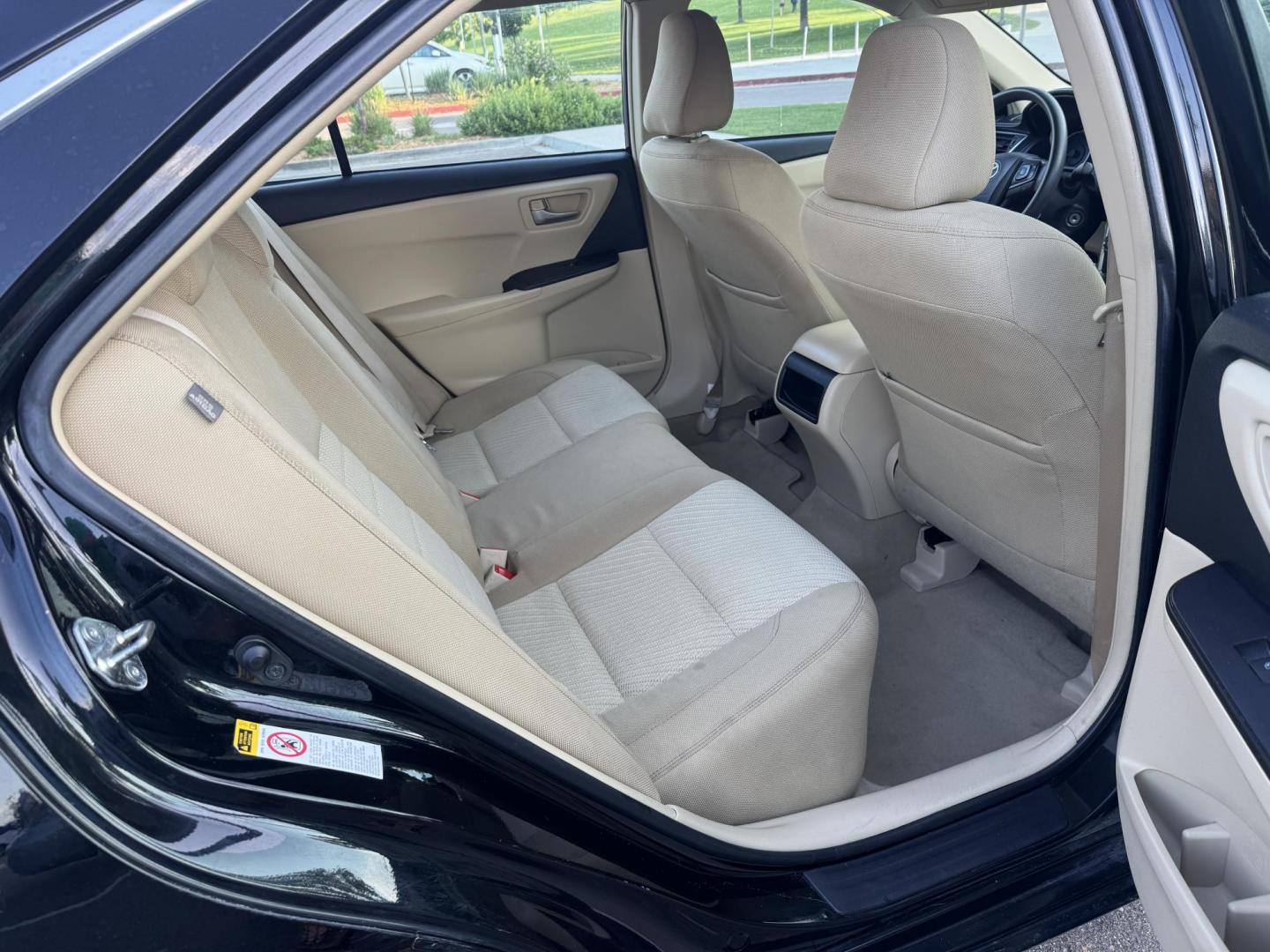 2016 Black /Tan Toyota Camry SE (4T1BF1FK2GU) with an 2.5L L4 DOHC 16V engine, 6-Speed Automatic transmission, located at 2510 47th St. Suite 200, Boulder, CO, 80301, (303) 641-0333, 40.026196, -105.243217 - This, Low Mile, Non-Smoker Camry is a new Acquisition by Boulder Motors, of Boulder Colorado. It is Finished in Toyota’s Midnight Black Metallic with Flaxen interior. It has clean CarFax and Autocheck showing No Odometer or Problems reported Ever. It has a Clean, Clear CO Title. Some of the ad - Photo#17