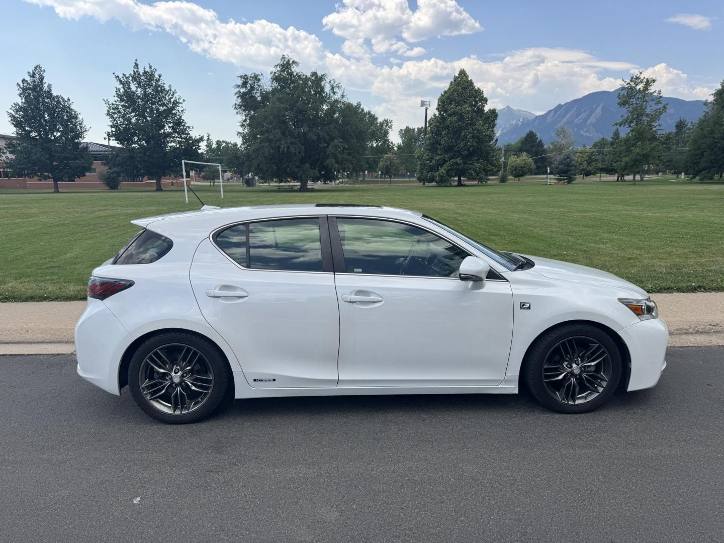 2012 White /Black Lexus CT 200h Base (JTHKD5BH1C2) with an 1.8L L4 HYBRID engine, Continuously Variable Transmission transmission, located at 2510 47th St. Suite 200, Boulder, CO, 80301, (303) 641-0333, 40.026196, -105.243217 - This Non smoker, Southern and Colorado owned 2012 Lexus CT 200H Premium was acquired by Boulder Motors in 2023 and used as a Company Car ever since. It is finished in Starfire Pearl with Black Interior. The Car Fax and Auto check is clean and Clear showing one minor accident. The Colorado title is C - Photo#15
