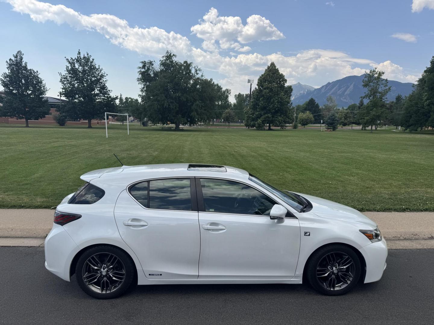 2012 White /Black Lexus CT 200h Base (JTHKD5BH1C2) with an 1.8L L4 HYBRID engine, Continuously Variable Transmission transmission, located at 2510 47th St. Suite 200, Boulder, CO, 80301, (303) 641-0333, 40.026196, -105.243217 - This Non smoker, Southern and Colorado owned 2012 Lexus CT 200H Premium was acquired by Boulder Motors in 2023 and used as a Company Car ever since. It is finished in Starfire Pearl with Black Interior. The Car Fax and Auto check is clean and Clear showing one minor accident. The Colorado title is C - Photo#16