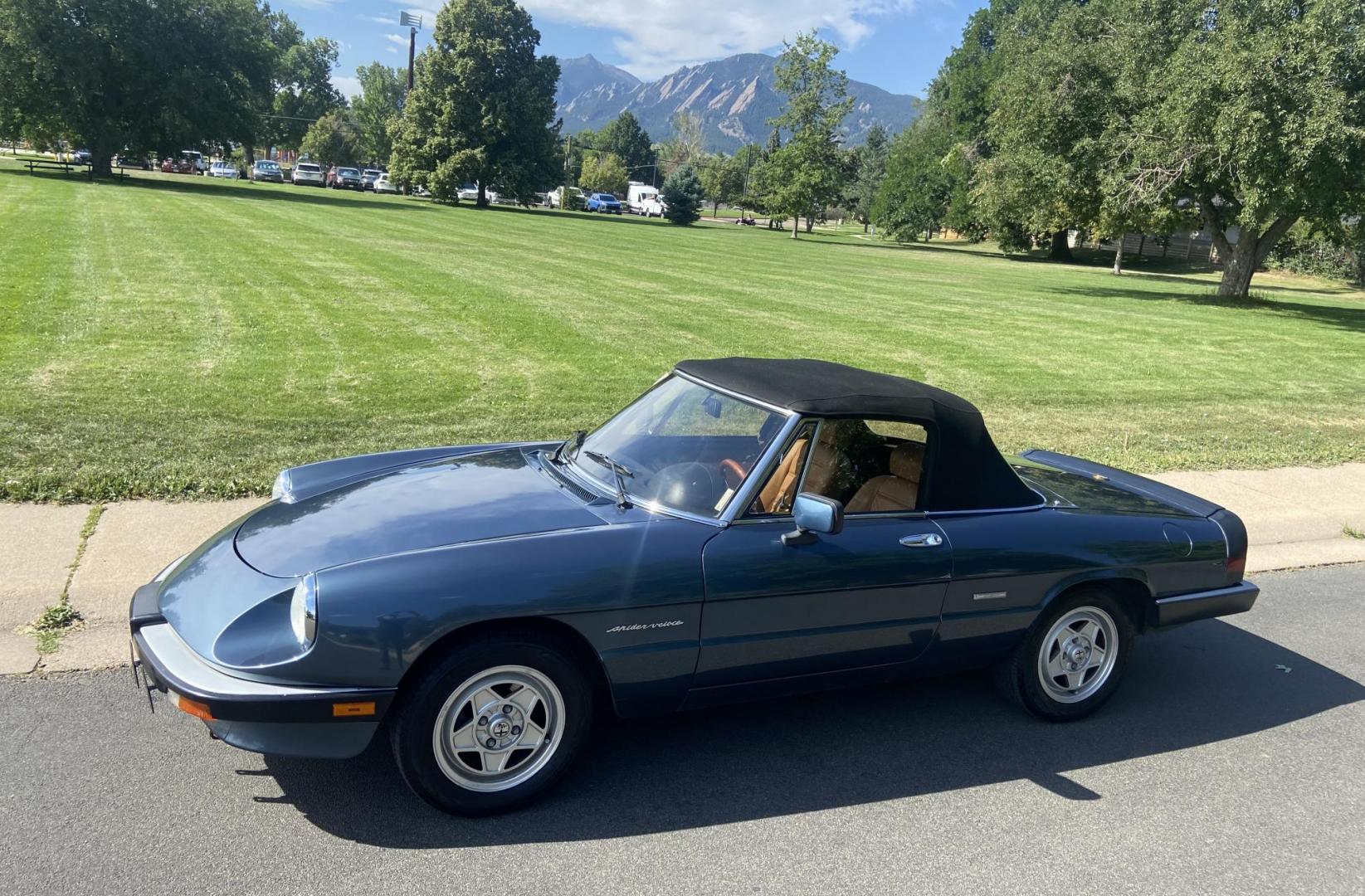 1990 Blue /Tan Alfa Romeo Spider Veloce convertible (ZARBA12G5L6) with an 2.0L L4 SOHC 8V engine, 5-Speed Manual transmission, located at 2510 47th St. Suite 200, Boulder, CO, 80301, (303) 641-0333, 40.026196, -105.243217 - Photo#0