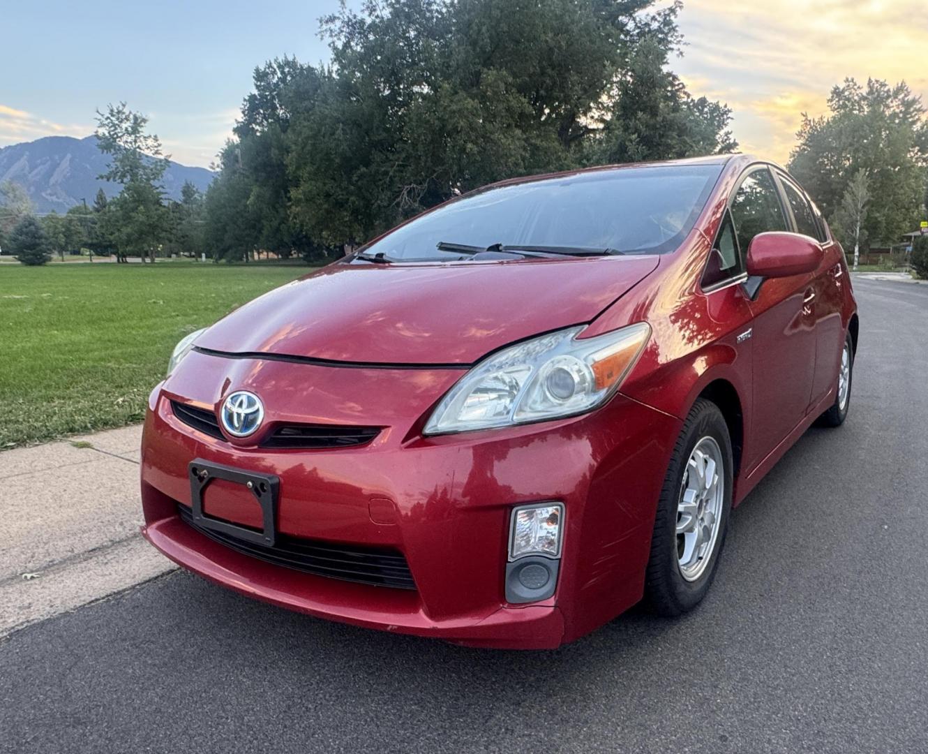 2011 Red /Black Toyota Prius Prius IV (JTDKN3DU1B0) with an 1.8L L4 DOHC 16V engine, Continuously Variable Transmission transmission, located at 2510 47th St. Suite 200, Boulder, CO, 80301, (303) 641-0333, 40.026196, -105.243217 - This Non smoker, Wyoming and Colorado owned 2011 Prius Iv was acquired by Boulder Motors in 2017 and used as a Company Car ever since. It is finished in Barcelona Red Metallic (3R3) with Light Gray Interior. The Car Fax and Auto check is clean and Clear showing no accidents. The title is Clean Clear - Photo#3