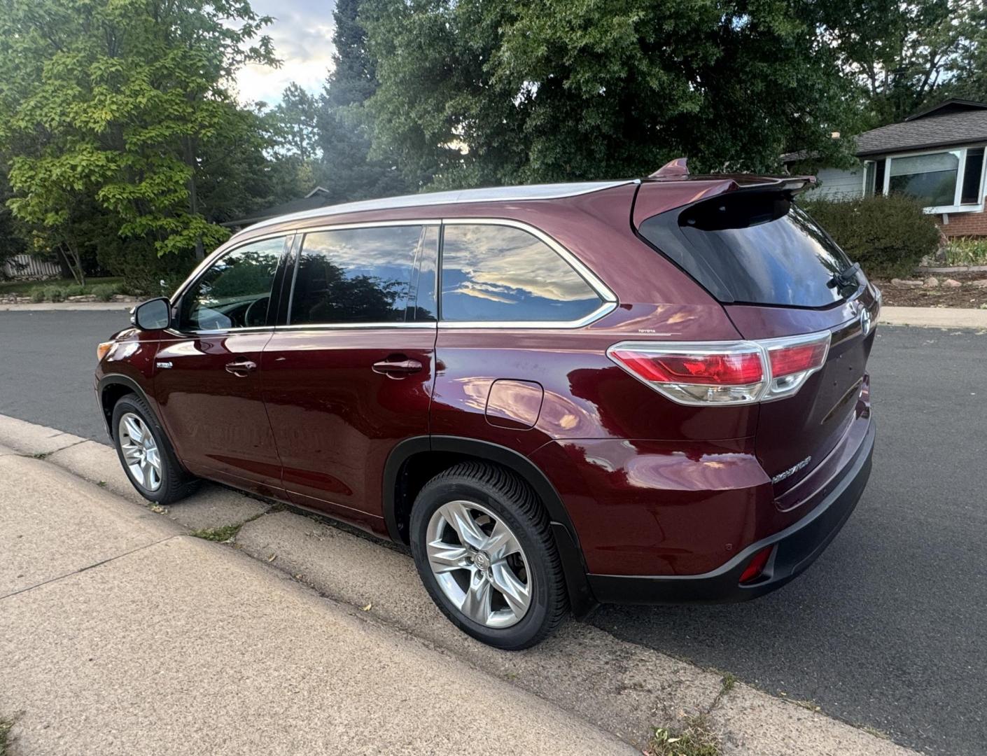 2015 Red /Tan Toyota Highlander Hybrid Limited AWD (5TDDCRFH9FS) with an 3.3L V6 DOHC 24V HYBRID engine, Continuously Variable Transmission transmission, located at 2510 47th St. Suite 200, Boulder, CO, 80301, (303) 641-0333, 40.026196, -105.243217 - This Beautiful 2015 Toyota Highlander Hybrid Limited is a recent acquisition by Boulder Motors. It is finished in Toyota’s Ooh La La Rouge Mica with Almond Perforated Leather. The Colorado title is Clean Clear. Some Features: Color-keyed rear spoiler with LED center high-mount stop light · - Photo#12