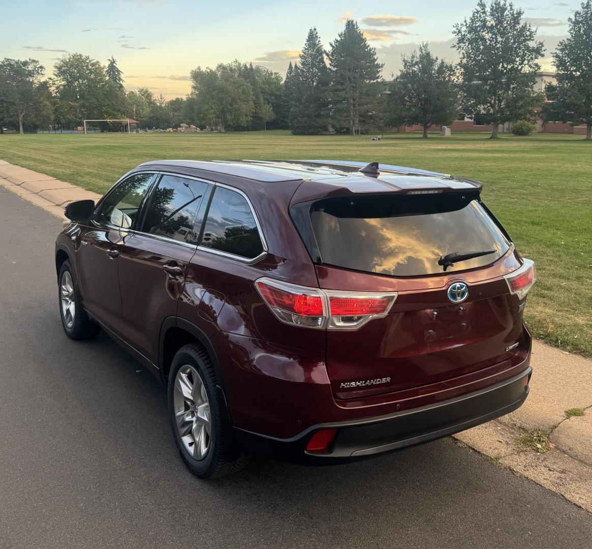 2015 Red /Tan Toyota Highlander Hybrid Limited AWD (5TDDCRFH9FS) with an 3.3L V6 DOHC 24V HYBRID engine, Continuously Variable Transmission transmission, located at 2510 47th St. Suite 200, Boulder, CO, 80301, (303) 641-0333, 40.026196, -105.243217 - This Beautiful 2015 Toyota Highlander Hybrid Limited is a recent acquisition by Boulder Motors. It is finished in Toyota’s Ooh La La Rouge Mica with Almond Perforated Leather. The Colorado title is Clean Clear. Some Features: Color-keyed rear spoiler with LED center high-mount stop light · - Photo#17