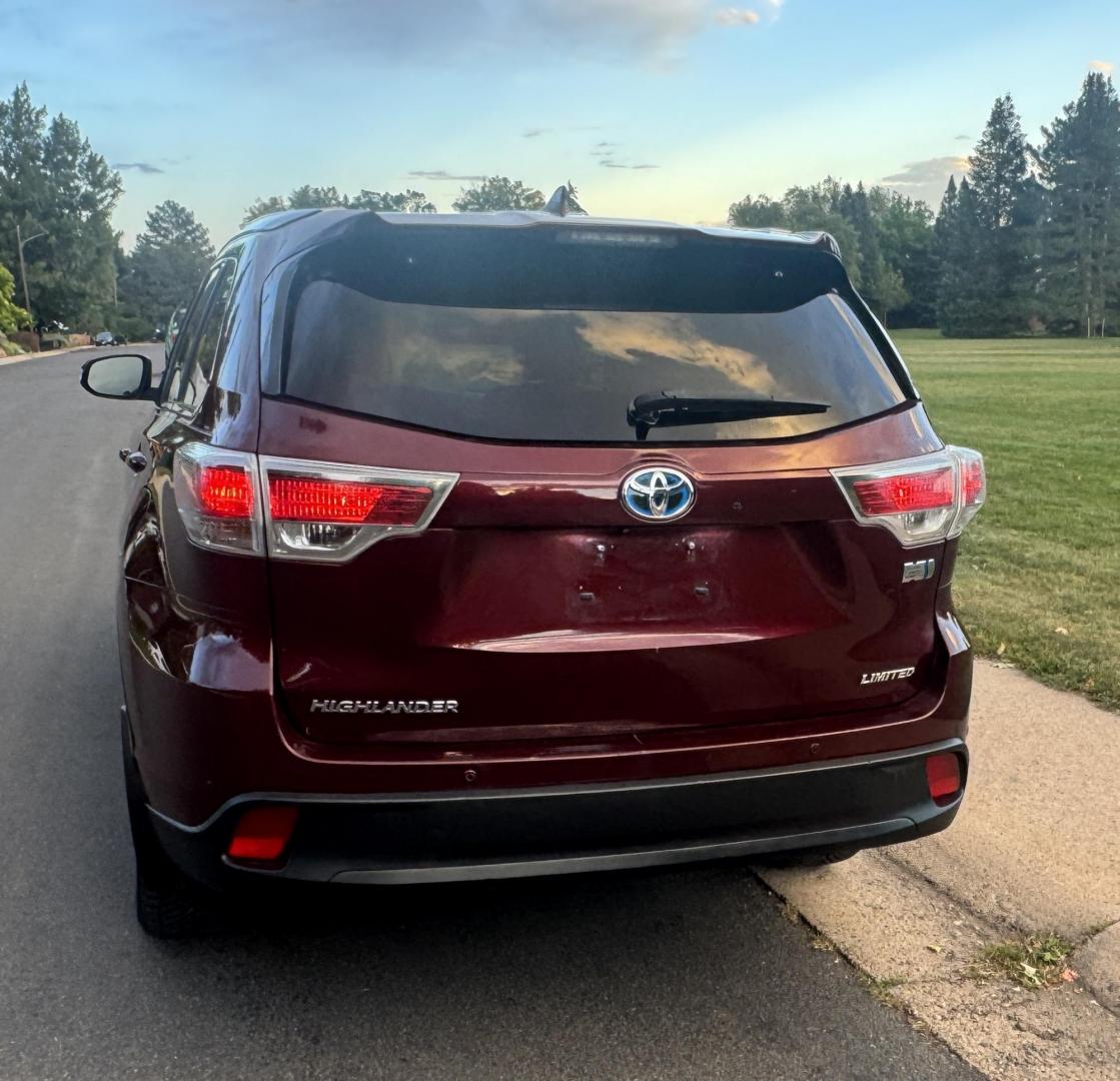 2015 Red /Tan Toyota Highlander Hybrid Limited AWD (5TDDCRFH9FS) with an 3.3L V6 DOHC 24V HYBRID engine, Continuously Variable Transmission transmission, located at 2510 47th St. Suite 200, Boulder, CO, 80301, (303) 641-0333, 40.026196, -105.243217 - This Beautiful 2015 Toyota Highlander Hybrid Limited is a recent acquisition by Boulder Motors. It is finished in Toyota’s Ooh La La Rouge Mica with Almond Perforated Leather. The Colorado title is Clean Clear. Some Features: Color-keyed rear spoiler with LED center high-mount stop light · - Photo#15