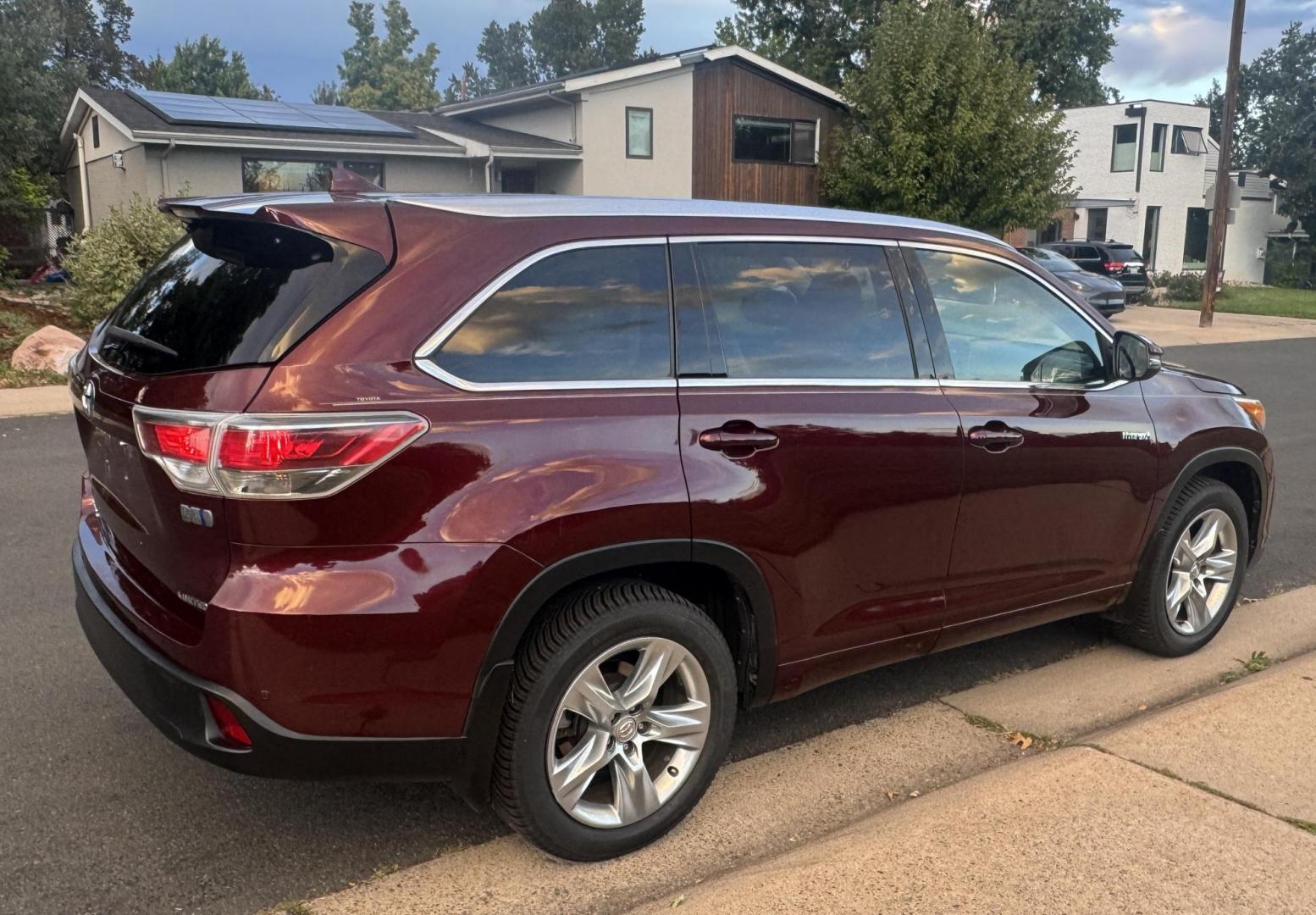 2015 Red /Tan Toyota Highlander Hybrid Limited AWD (5TDDCRFH9FS) with an 3.3L V6 DOHC 24V HYBRID engine, Continuously Variable Transmission transmission, located at 2510 47th St. Suite 200, Boulder, CO, 80301, (303) 641-0333, 40.026196, -105.243217 - This Beautiful 2015 Toyota Highlander Hybrid Limited is a recent acquisition by Boulder Motors. It is finished in Toyota’s Ooh La La Rouge Mica with Almond Perforated Leather. The Colorado title is Clean Clear. Some Features: Color-keyed rear spoiler with LED center high-mount stop light · - Photo#20