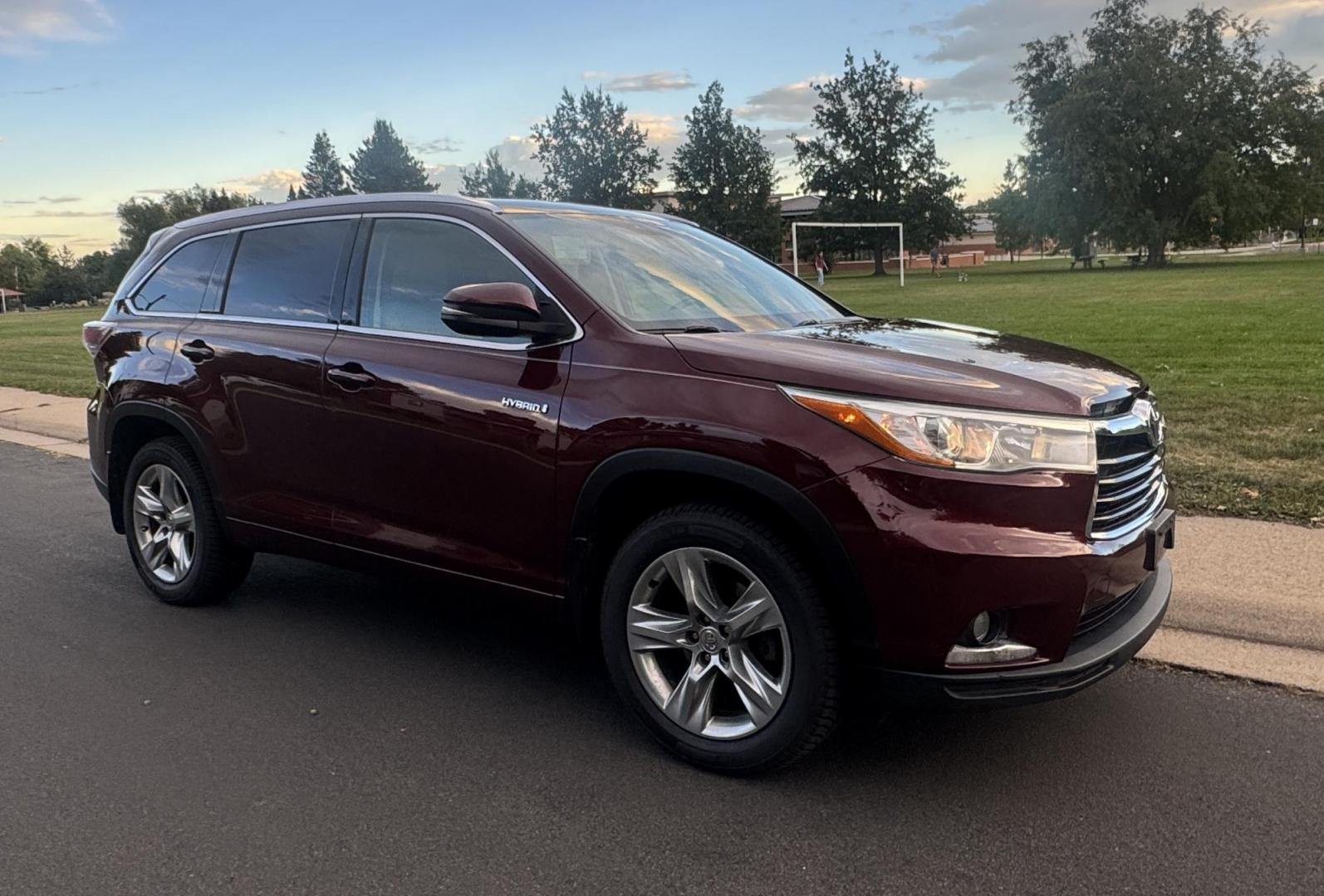 2015 Red /Tan Toyota Highlander Hybrid Limited AWD (5TDDCRFH9FS) with an 3.3L V6 DOHC 24V HYBRID engine, Continuously Variable Transmission transmission, located at 2510 47th St. Suite 200, Boulder, CO, 80301, (303) 641-0333, 40.026196, -105.243217 - This Beautiful 2015 Toyota Highlander Hybrid Limited is a recent acquisition by Boulder Motors. It is finished in Toyota’s Ooh La La Rouge Mica with Almond Perforated Leather. The Colorado title is Clean Clear. Some Features: Color-keyed rear spoiler with LED center high-mount stop light · - Photo#28