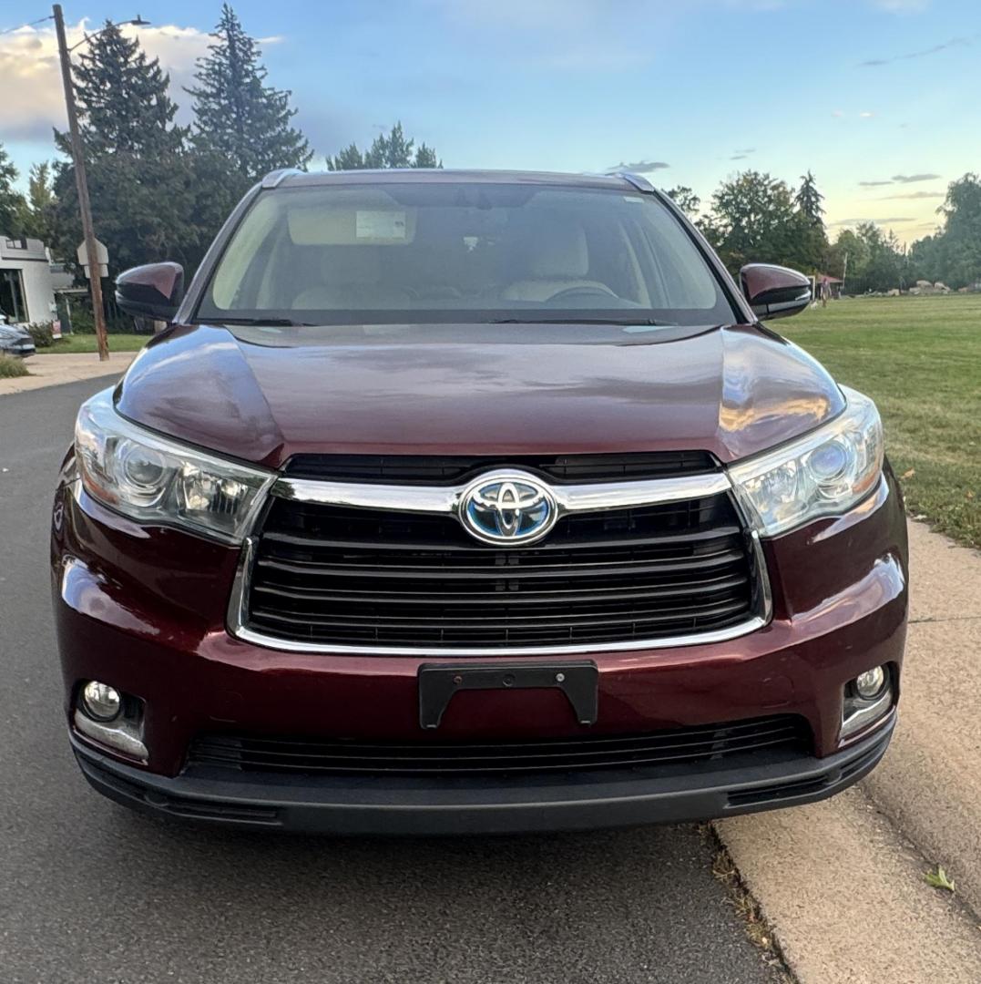2015 Red /Tan Toyota Highlander Hybrid Limited AWD (5TDDCRFH9FS) with an 3.3L V6 DOHC 24V HYBRID engine, Continuously Variable Transmission transmission, located at 2510 47th St. Suite 200, Boulder, CO, 80301, (303) 641-0333, 40.026196, -105.243217 - This Beautiful 2015 Toyota Highlander Hybrid Limited is a recent acquisition by Boulder Motors. It is finished in Toyota’s Ooh La La Rouge Mica with Almond Perforated Leather. The Colorado title is Clean Clear. Some Features: Color-keyed rear spoiler with LED center high-mount stop light · - Photo#29