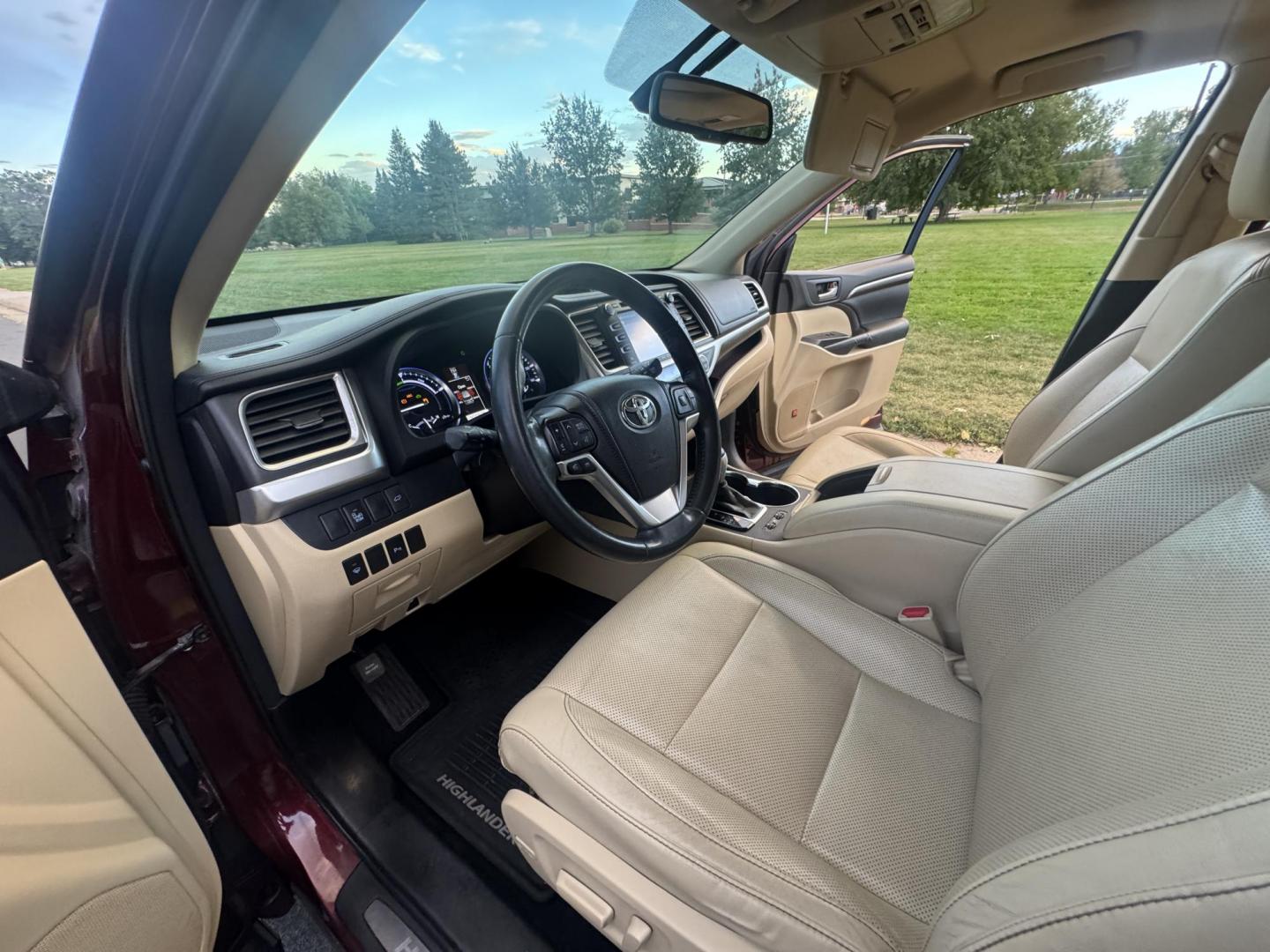 2015 Red /Tan Toyota Highlander Hybrid Limited AWD (5TDDCRFH9FS) with an 3.3L V6 DOHC 24V HYBRID engine, Continuously Variable Transmission transmission, located at 2510 47th St. Suite 200, Boulder, CO, 80301, (303) 641-0333, 40.026196, -105.243217 - This Beautiful 2015 Toyota Highlander Hybrid Limited is a recent acquisition by Boulder Motors. It is finished in Toyota’s Ooh La La Rouge Mica with Almond Perforated Leather. The Colorado title is Clean Clear. Some Features: Color-keyed rear spoiler with LED center high-mount stop light · - Photo#34