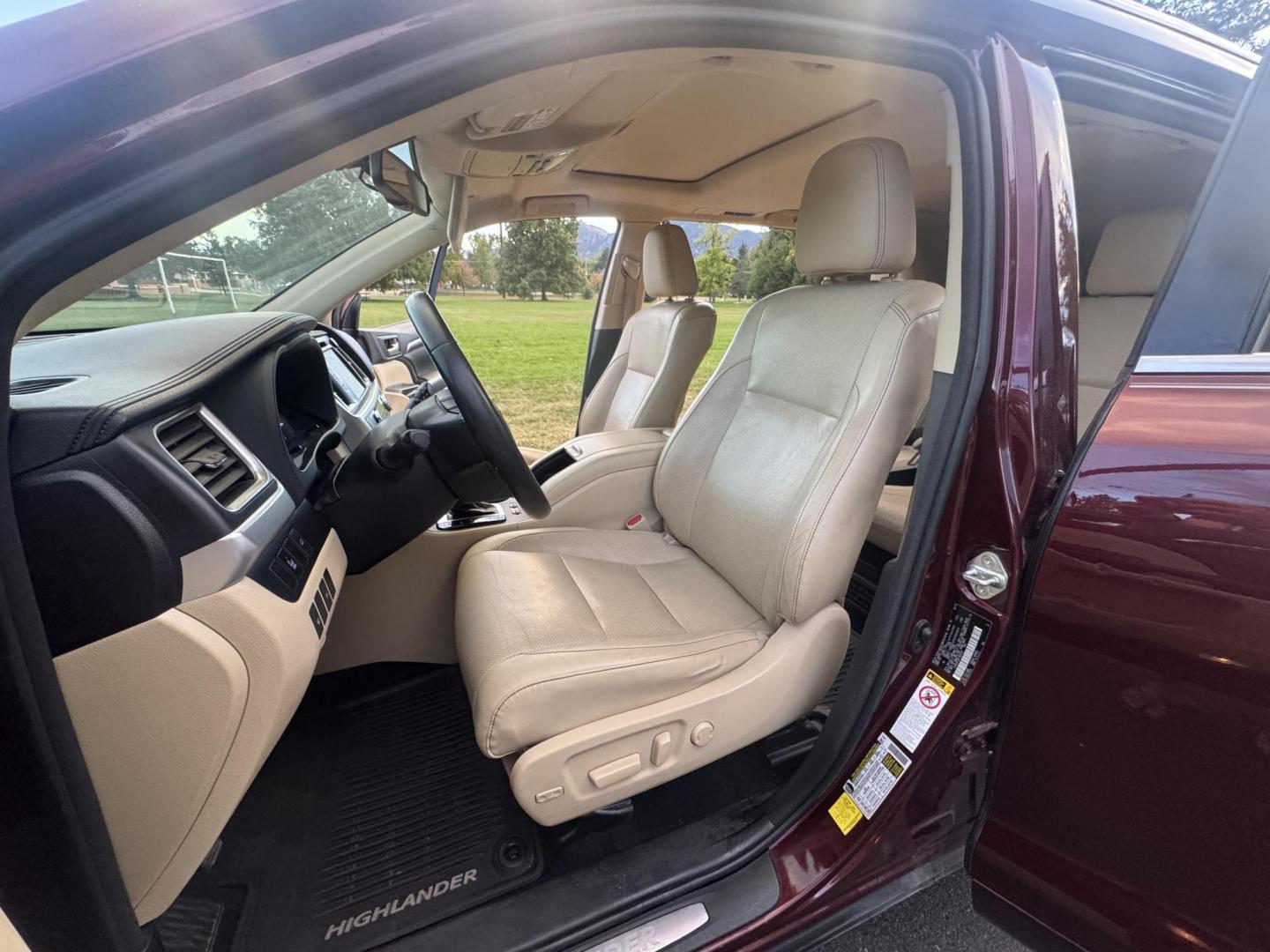 2015 Red /Tan Toyota Highlander Hybrid Limited AWD (5TDDCRFH9FS) with an 3.3L V6 DOHC 24V HYBRID engine, Continuously Variable Transmission transmission, located at 2510 47th St. Suite 200, Boulder, CO, 80301, (303) 641-0333, 40.026196, -105.243217 - This Beautiful 2015 Toyota Highlander Hybrid Limited is a recent acquisition by Boulder Motors. It is finished in Toyota’s Ooh La La Rouge Mica with Almond Perforated Leather. The Colorado title is Clean Clear. Some Features: Color-keyed rear spoiler with LED center high-mount stop light · - Photo#35
