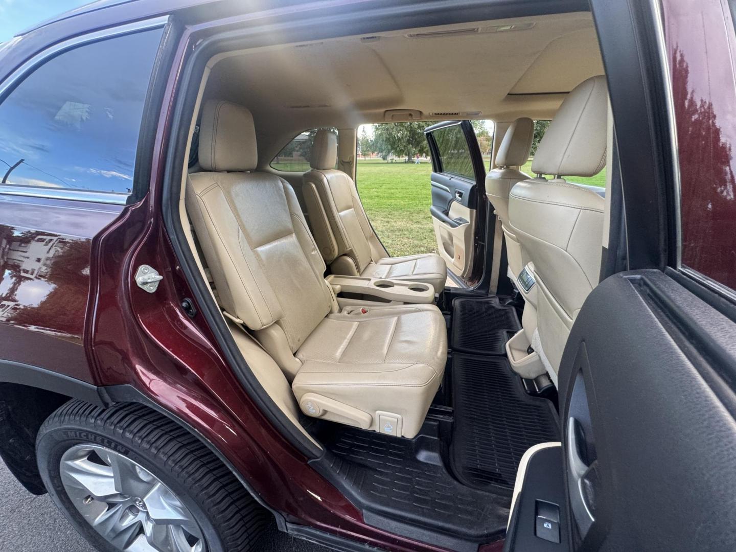 2015 Red /Tan Toyota Highlander Hybrid Limited AWD (5TDDCRFH9FS) with an 3.3L V6 DOHC 24V HYBRID engine, Continuously Variable Transmission transmission, located at 2510 47th St. Suite 200, Boulder, CO, 80301, (303) 641-0333, 40.026196, -105.243217 - This Beautiful 2015 Toyota Highlander Hybrid Limited is a recent acquisition by Boulder Motors. It is finished in Toyota’s Ooh La La Rouge Mica with Almond Perforated Leather. The Colorado title is Clean Clear. Some Features: Color-keyed rear spoiler with LED center high-mount stop light · - Photo#39