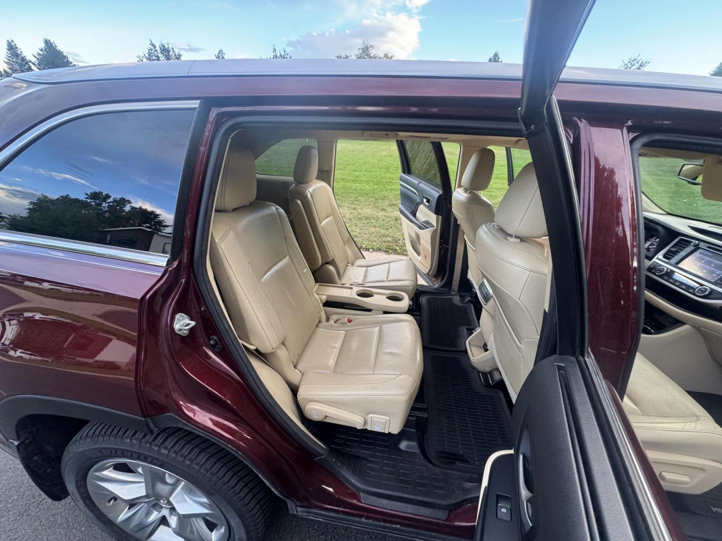 2015 Red /Tan Toyota Highlander Hybrid Limited AWD (5TDDCRFH9FS) with an 3.3L V6 DOHC 24V HYBRID engine, Continuously Variable Transmission transmission, located at 2510 47th St. Suite 200, Boulder, CO, 80301, (303) 641-0333, 40.026196, -105.243217 - This Beautiful 2015 Toyota Highlander Hybrid Limited is a recent acquisition by Boulder Motors. It is finished in Toyota’s Ooh La La Rouge Mica with Almond Perforated Leather. The Colorado title is Clean Clear. Some Features: Color-keyed rear spoiler with LED center high-mount stop light · - Photo#40