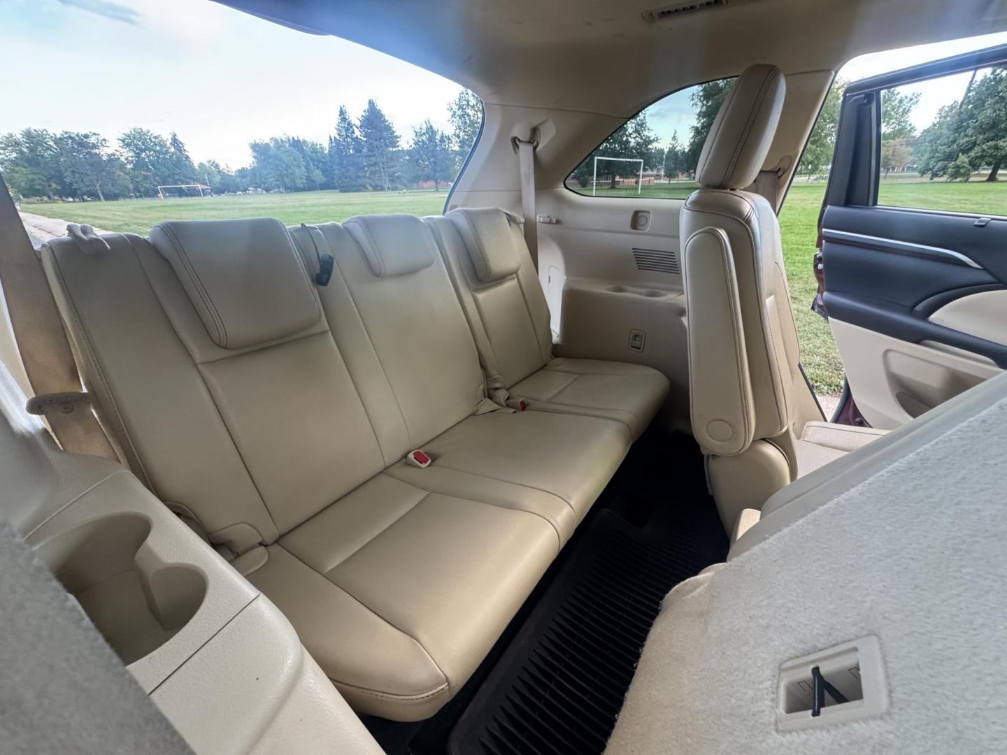 2015 Red /Tan Toyota Highlander Hybrid Limited AWD (5TDDCRFH9FS) with an 3.3L V6 DOHC 24V HYBRID engine, Continuously Variable Transmission transmission, located at 2510 47th St. Suite 200, Boulder, CO, 80301, (303) 641-0333, 40.026196, -105.243217 - This Beautiful 2015 Toyota Highlander Hybrid Limited is a recent acquisition by Boulder Motors. It is finished in Toyota’s Ooh La La Rouge Mica with Almond Perforated Leather. The Colorado title is Clean Clear. Some Features: Color-keyed rear spoiler with LED center high-mount stop light · - Photo#41