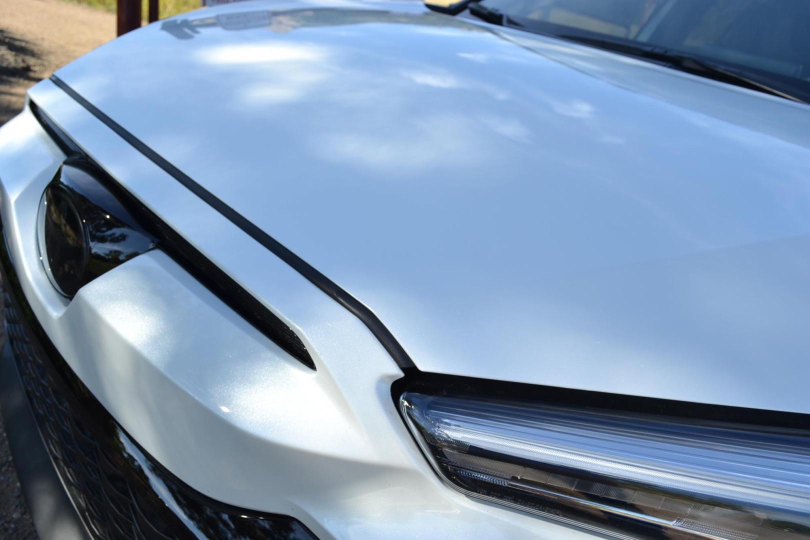 2023 White /Gray Toyota Corolla Cross XSE AWD (7MUFBABG2PV) with an 2.0L L4 DOHC 16V engine, CVT transmission, located at 2510 47th St. Suite 200, Boulder, CO, 80301, (303) 641-0333, 40.026196, -105.243217 - This Beautiful One Owner, Super Low Mile, (5,554 mi.) Corolla Cross Hybrid XSE is a Recent acquisition by Boulder Motors in Boulder Colorado. It is finished in Toyota Gorgeous Wind Chill Pearl with Dark Gray Interior It has a One Owner Clean CarFax and Autocheck showing No Odometer or Problems repor - Photo#16