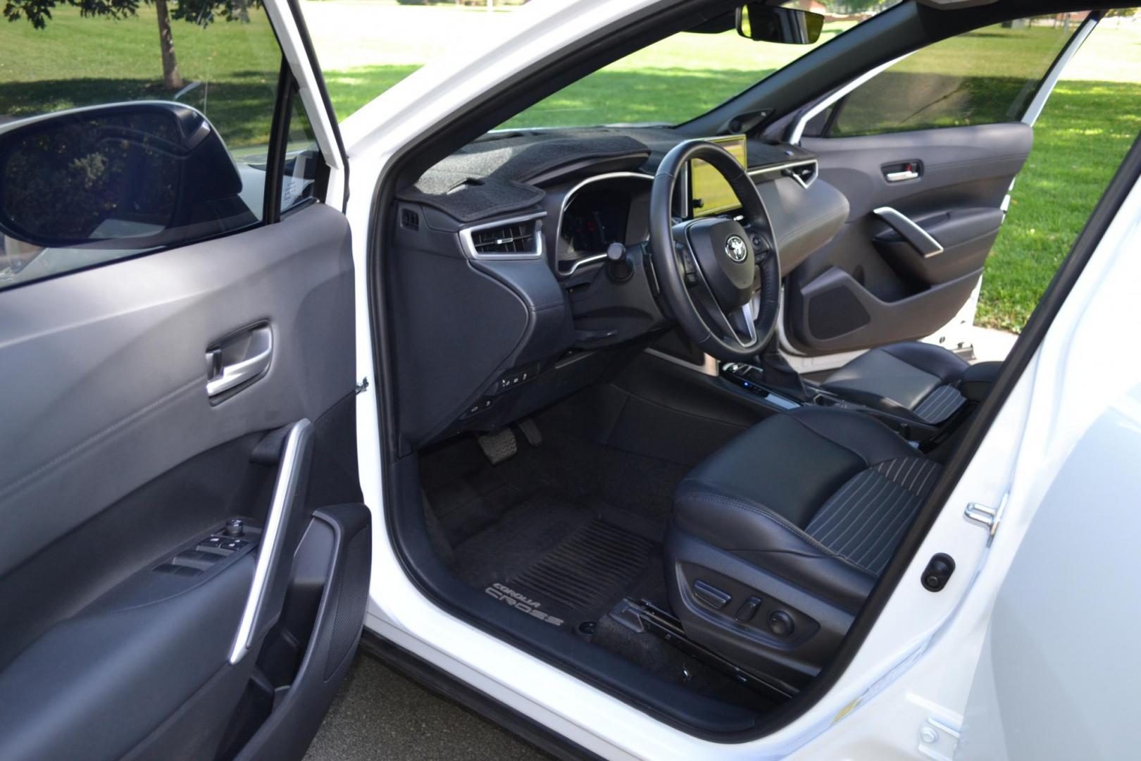2023 White /Gray Toyota Corolla Cross XSE AWD (7MUFBABG2PV) with an 2.0L L4 DOHC 16V engine, CVT transmission, located at 2510 47th St. Suite 200, Boulder, CO, 80301, (303) 641-0333, 40.026196, -105.243217 - This Beautiful One Owner, Super Low Mile, (5,554 mi.) Corolla Cross Hybrid XSE is a Recent acquisition by Boulder Motors in Boulder Colorado. It is finished in Toyota Gorgeous Wind Chill Pearl with Dark Gray Interior It has a One Owner Clean CarFax and Autocheck showing No Odometer or Problems repor - Photo#18