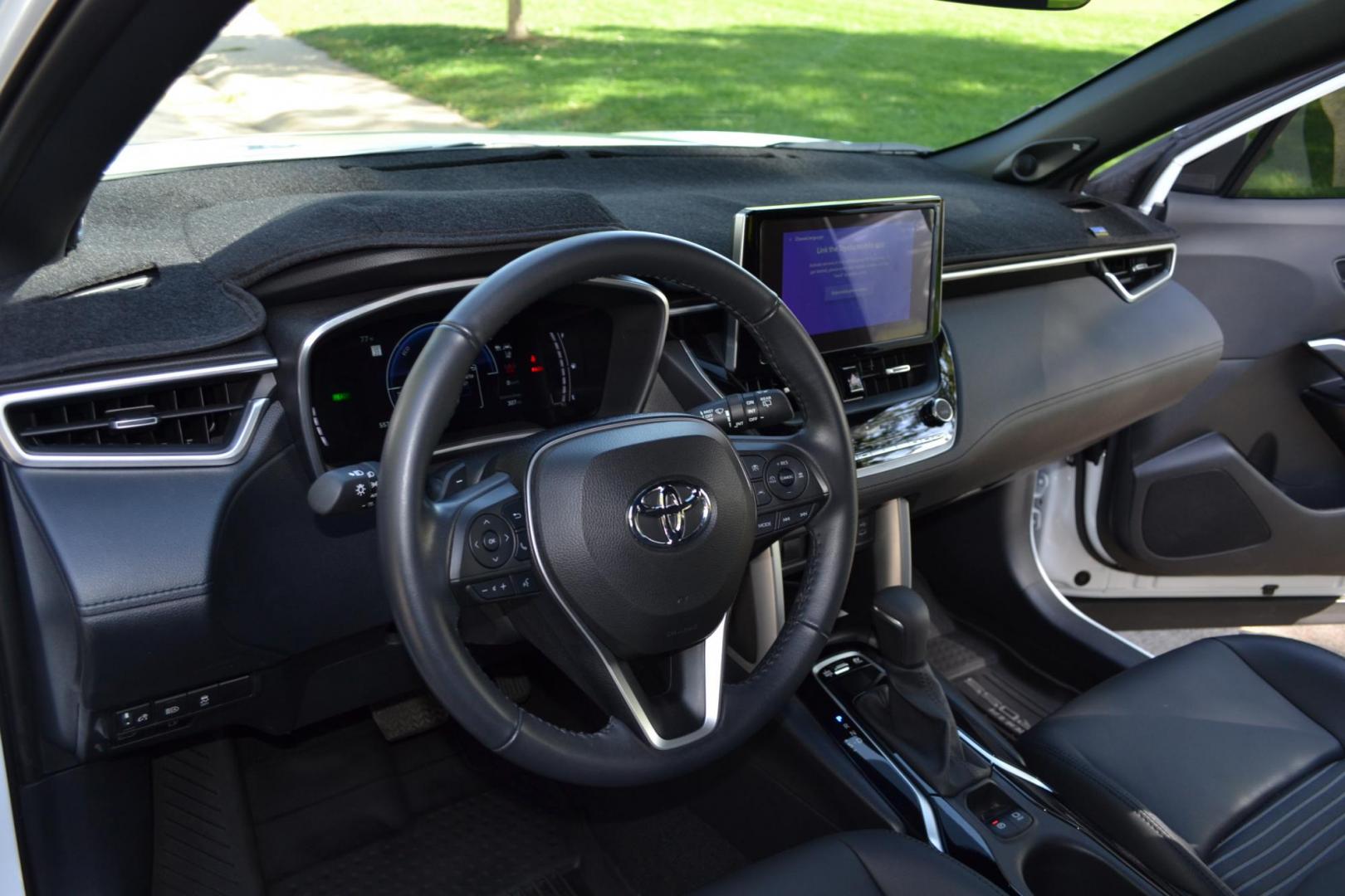 2023 White /Gray Toyota Corolla Cross XSE AWD (7MUFBABG2PV) with an 2.0L L4 DOHC 16V engine, CVT transmission, located at 2510 47th St. Suite 200, Boulder, CO, 80301, (303) 641-0333, 40.026196, -105.243217 - This Beautiful One Owner, Super Low Mile, (5,554 mi.) Corolla Cross Hybrid XSE is a Recent acquisition by Boulder Motors in Boulder Colorado. It is finished in Toyota Gorgeous Wind Chill Pearl with Dark Gray Interior It has a One Owner Clean CarFax and Autocheck showing No Odometer or Problems repor - Photo#21