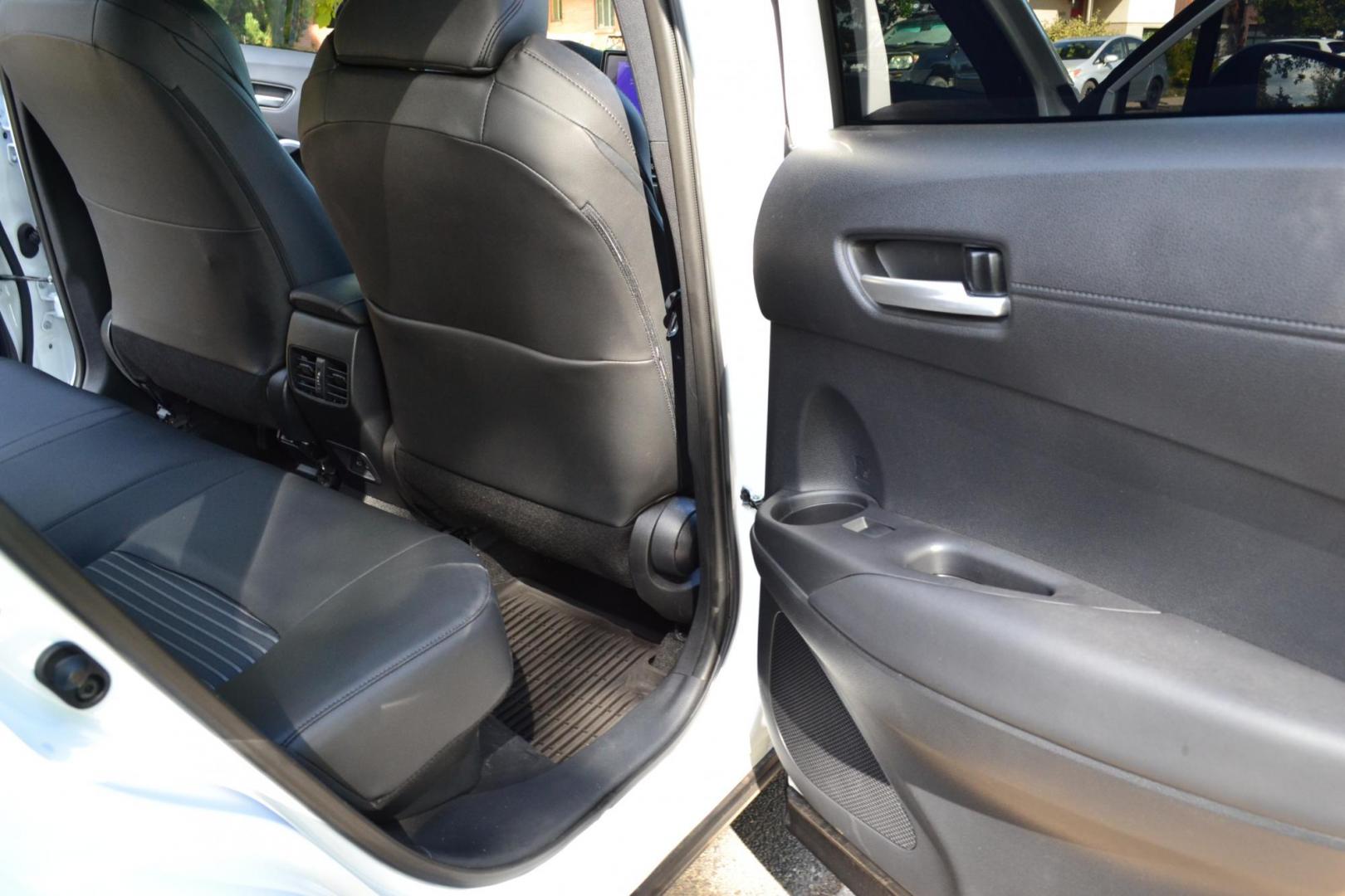 2023 White /Gray Toyota Corolla Cross XSE AWD (7MUFBABG2PV) with an 2.0L L4 DOHC 16V engine, CVT transmission, located at 2510 47th St. Suite 200, Boulder, CO, 80301, (303) 641-0333, 40.026196, -105.243217 - This Beautiful One Owner, Super Low Mile, (5,554 mi.) Corolla Cross Hybrid XSE is a Recent acquisition by Boulder Motors in Boulder Colorado. It is finished in Toyota Gorgeous Wind Chill Pearl with Dark Gray Interior It has a One Owner Clean CarFax and Autocheck showing No Odometer or Problems repor - Photo#27