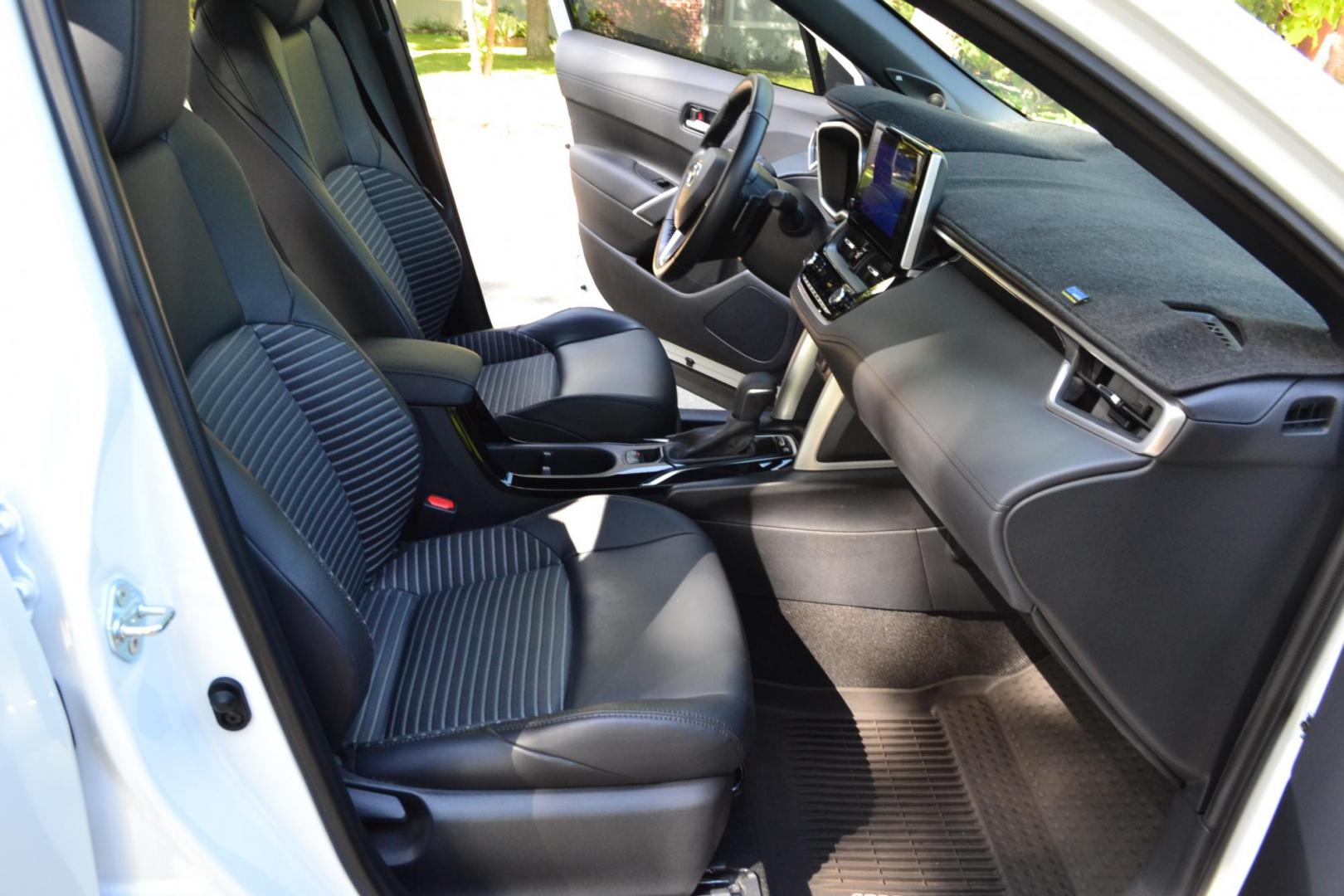 2023 White /Gray Toyota Corolla Cross XSE AWD (7MUFBABG2PV) with an 2.0L L4 DOHC 16V engine, CVT transmission, located at 2510 47th St. Suite 200, Boulder, CO, 80301, (303) 641-0333, 40.026196, -105.243217 - This Beautiful One Owner, Super Low Mile, (5,554 mi.) Corolla Cross Hybrid XSE is a Recent acquisition by Boulder Motors in Boulder Colorado. It is finished in Toyota Gorgeous Wind Chill Pearl with Dark Gray Interior It has a One Owner Clean CarFax and Autocheck showing No Odometer or Problems repor - Photo#29