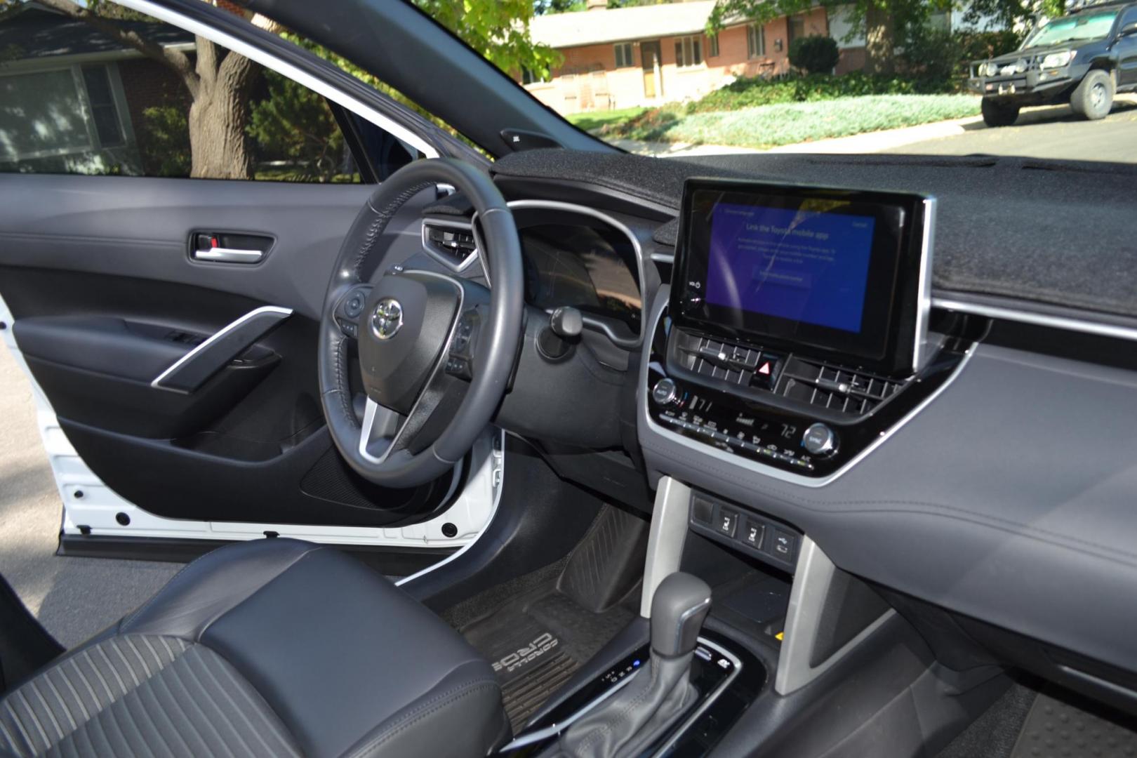 2023 White /Gray Toyota Corolla Cross XSE AWD (7MUFBABG2PV) with an 2.0L L4 DOHC 16V engine, CVT transmission, located at 2510 47th St. Suite 200, Boulder, CO, 80301, (303) 641-0333, 40.026196, -105.243217 - This Beautiful One Owner, Super Low Mile, (5,554 mi.) Corolla Cross Hybrid XSE is a Recent acquisition by Boulder Motors in Boulder Colorado. It is finished in Toyota Gorgeous Wind Chill Pearl with Dark Gray Interior It has a One Owner Clean CarFax and Autocheck showing No Odometer or Problems repor - Photo#33