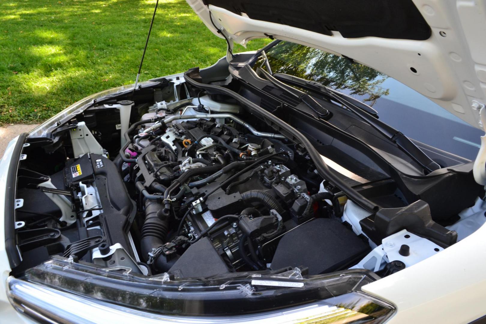 2023 White /Gray Toyota Corolla Cross XSE AWD (7MUFBABG2PV) with an 2.0L L4 DOHC 16V engine, CVT transmission, located at 2510 47th St. Suite 200, Boulder, CO, 80301, (303) 641-0333, 40.026196, -105.243217 - This Beautiful One Owner, Super Low Mile, (5,554 mi.) Corolla Cross Hybrid XSE is a Recent acquisition by Boulder Motors in Boulder Colorado. It is finished in Toyota Gorgeous Wind Chill Pearl with Dark Gray Interior It has a One Owner Clean CarFax and Autocheck showing No Odometer or Problems repor - Photo#38