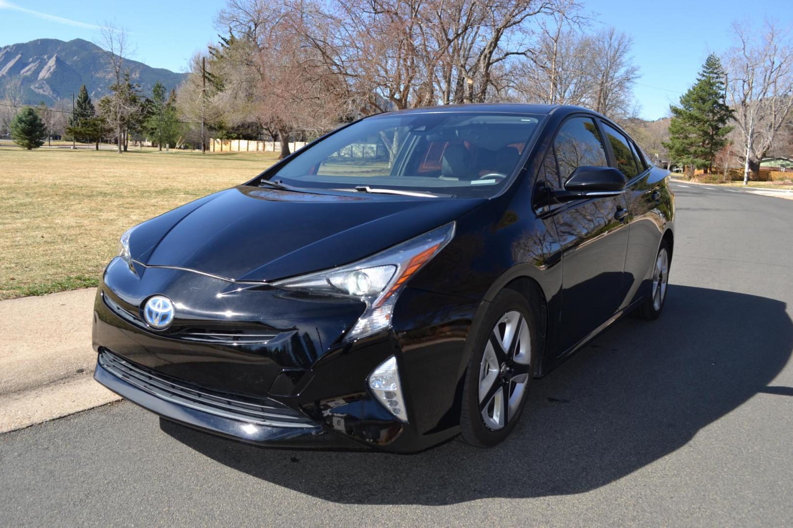 2016 Black /Black Toyota Prius 3 Touring (JTDKARFU2G3) with an 1.8L L4 DOHC 16V HYBRID engine, CVT transmission, located at 2510 47th St. Suite 200, Boulder, CO, 80301, (303) 641-0333, 40.026196, -105.243217 - This Beautiful Utah owned 2016 Toyota Prius Three Touring is a recent acquisition by Boulder Motors. It is finished in Toyota’s Midnight Black Metallic with black interior. The Car Fax and Auto check is clean and Clear. The Colorado title is Clean Clear. Premium Features: [8K] Lower Console/Shi - Photo#0