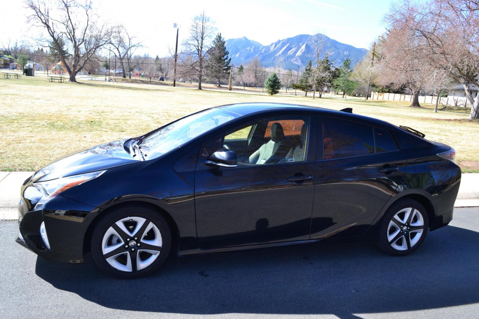 2016 Black /Black Toyota Prius 3 Touring (JTDKARFU2G3) with an 1.8L L4 DOHC 16V HYBRID engine, CVT transmission, located at 2510 47th St. Suite 200, Boulder, CO, 80301, (303) 641-0333, 40.026196, -105.243217 - This Beautiful Utah owned 2016 Toyota Prius Three Touring is a recent acquisition by Boulder Motors. It is finished in Toyota’s Midnight Black Metallic with black interior. The Car Fax and Auto check is clean and Clear. The Colorado title is Clean Clear. Premium Features: [8K] Lower Console/Shi - Photo#2