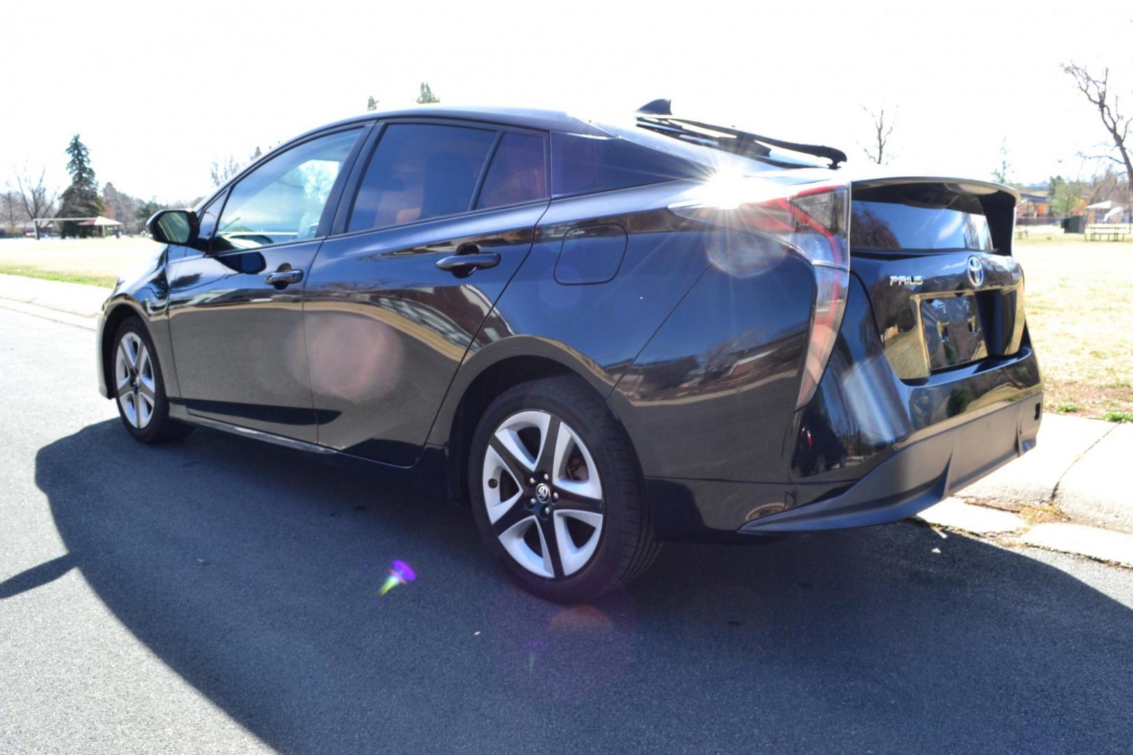 2016 Black /Black Toyota Prius 3 Touring (JTDKARFU2G3) with an 1.8L L4 DOHC 16V HYBRID engine, CVT transmission, located at 2510 47th St. Suite 200, Boulder, CO, 80301, (303) 641-0333, 40.026196, -105.243217 - This Beautiful Utah owned 2016 Toyota Prius Three Touring is a recent acquisition by Boulder Motors. It is finished in Toyota’s Midnight Black Metallic with black interior. The Car Fax and Auto check is clean and Clear. The Colorado title is Clean Clear. Premium Features: [8K] Lower Console/Shi - Photo#3
