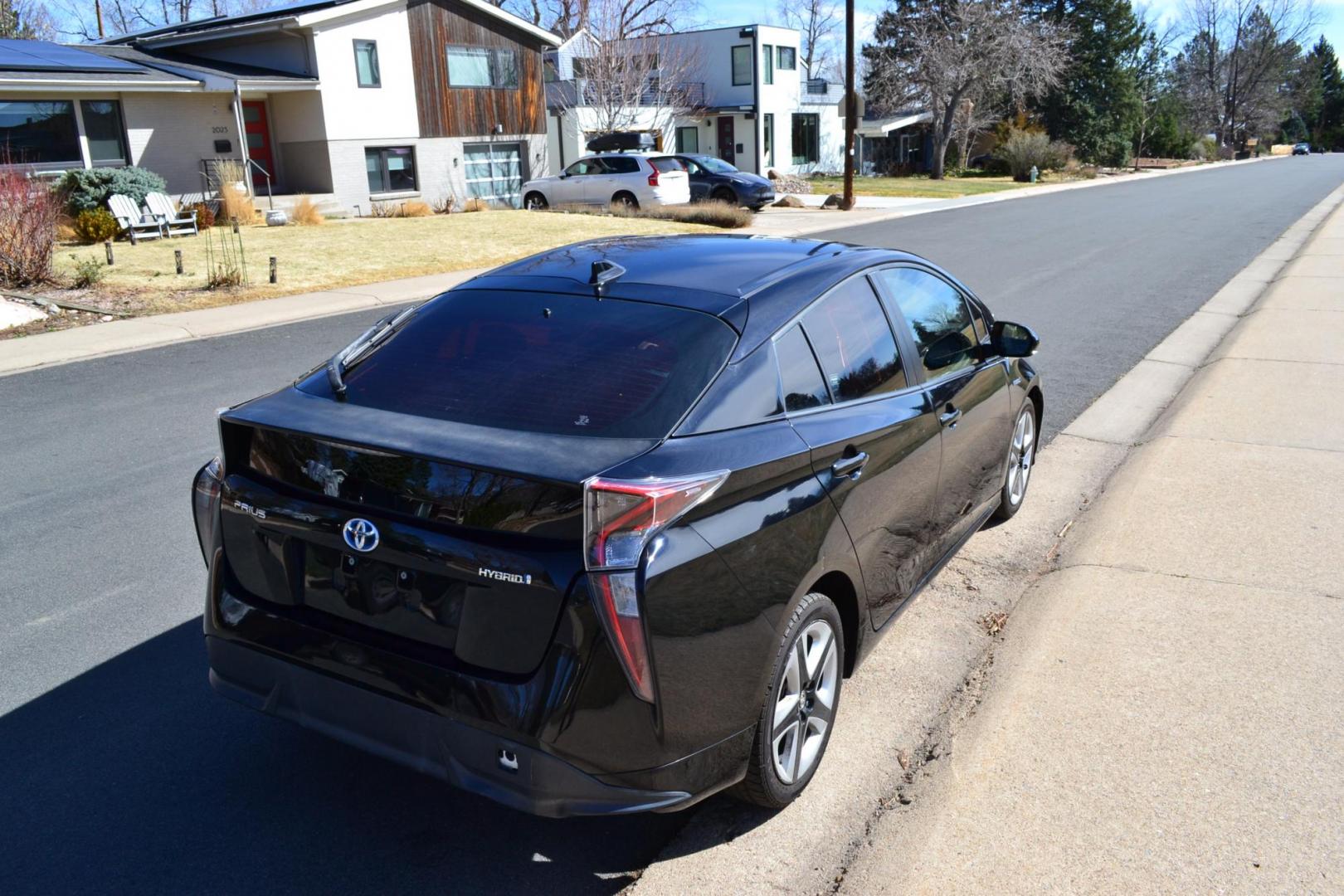 2016 Black /Black Toyota Prius 3 Touring (JTDKARFU2G3) with an 1.8L L4 DOHC 16V HYBRID engine, CVT transmission, located at 2510 47th St. Suite 200, Boulder, CO, 80301, (303) 641-0333, 40.026196, -105.243217 - This Beautiful Utah owned 2016 Toyota Prius Three Touring is a recent acquisition by Boulder Motors. It is finished in Toyota’s Midnight Black Metallic with black interior. The Car Fax and Auto check is clean and Clear. The Colorado title is Clean Clear. Premium Features: [8K] Lower Console/Shi - Photo#5