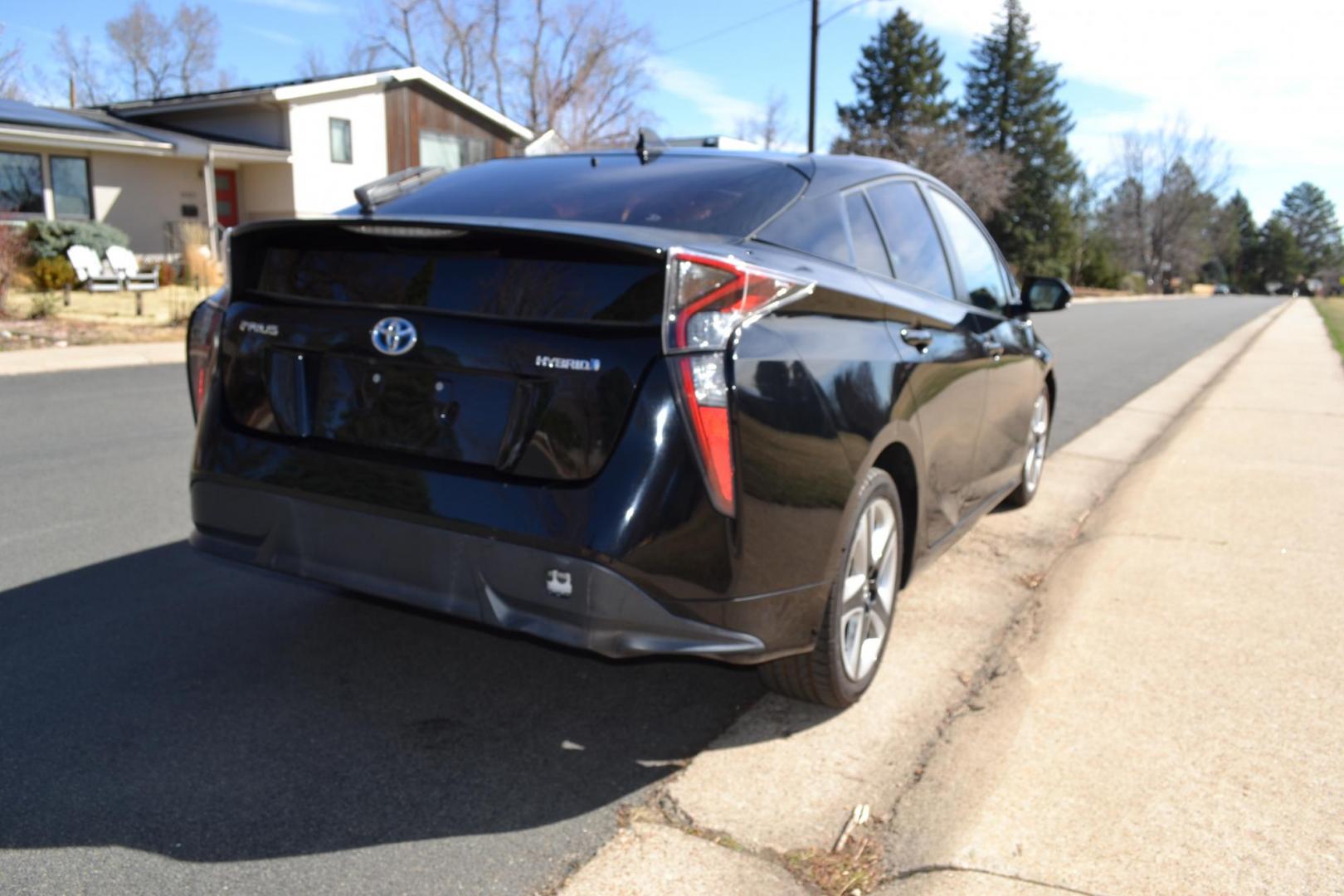 2016 Black /Black Toyota Prius 3 Touring (JTDKARFU2G3) with an 1.8L L4 DOHC 16V HYBRID engine, CVT transmission, located at 2510 47th St. Suite 200, Boulder, CO, 80301, (303) 641-0333, 40.026196, -105.243217 - This Beautiful Utah owned 2016 Toyota Prius Three Touring is a recent acquisition by Boulder Motors. It is finished in Toyota’s Midnight Black Metallic with black interior. The Car Fax and Auto check is clean and Clear. The Colorado title is Clean Clear. Premium Features: [8K] Lower Console/Shi - Photo#4