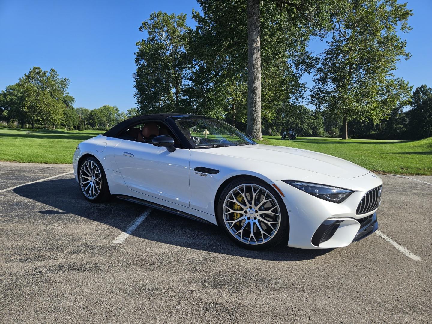2023 White /Tan Mercedes-Benz SL-Class SL55 (W1KVK8AB5PF) with an 4.0L V8 engine, 9A transmission, located at 2510 47th St. Suite 200, Boulder, CO, 80301, (303) 641-0333, 40.026196, -105.243217 - This Beautiful One Owner, Super Low Mile, (8,215 mi.) SL-Class SL55 is a Recent acquisition by Boulder Motors in Boulder Colorado. It is finished in Mercedes MANUFAKTUR Moonlight White Metallic (885) with Sienna Brown / Black Nappa Leather Interior. It has a One Owner Clean CarFax and Autocheck sho- Photo#2