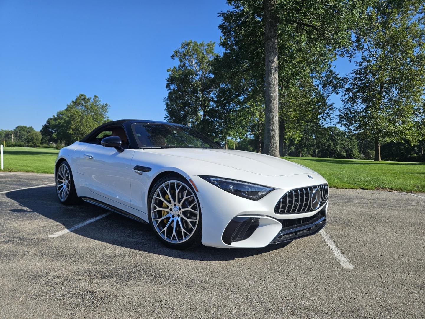 2023 White /Tan Mercedes-Benz SL-Class SL55 (W1KVK8AB5PF) with an 4.0L V8 engine, 9A transmission, located at 2510 47th St. Suite 200, Boulder, CO, 80301, (303) 641-0333, 40.026196, -105.243217 - This Beautiful One Owner, Super Low Mile, (8,215 mi.) SL-Class SL55 is a Recent acquisition by Boulder Motors in Boulder Colorado. It is finished in Mercedes MANUFAKTUR Moonlight White Metallic (885) with Sienna Brown / Black Nappa Leather Interior. It has a One Owner Clean CarFax and Autocheck sho- Photo#1