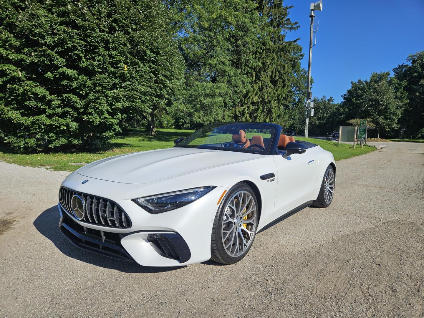 2023 White /Tan Mercedes-Benz SL-Class SL55 (W1KVK8AB5PF) with an 4.0L V8 engine, 9A transmission, located at 2510 47th St. Suite 200, Boulder, CO, 80301, (303) 641-0333, 40.026196, -105.243217 - This Beautiful One Owner, Super Low Mile, (8,215 mi.) SL-Class SL55 is a Recent acquisition by Boulder Motors in Boulder Colorado. It is finished in Mercedes MANUFAKTUR Moonlight White Metallic (885) with Sienna Brown / Black Nappa Leather Interior. It has a One Owner Clean CarFax and Autocheck sho- Photo#3
