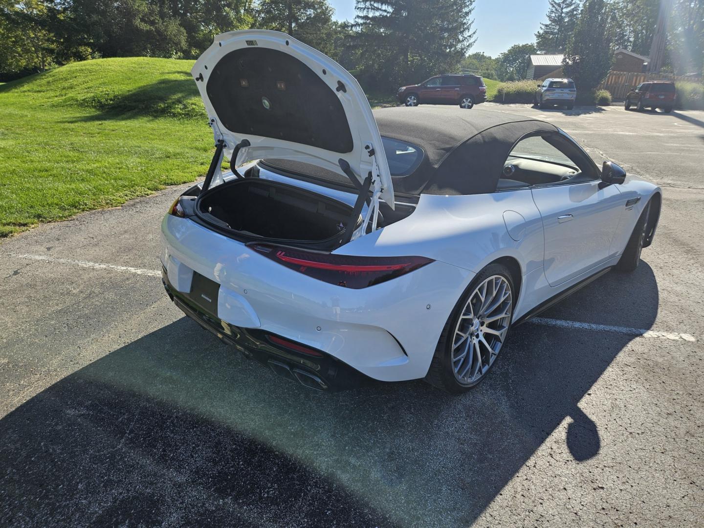 2023 White /Tan Mercedes-Benz SL-Class SL55 (W1KVK8AB5PF) with an 4.0L V8 engine, 9A transmission, located at 2510 47th St. Suite 200, Boulder, CO, 80301, (303) 641-0333, 40.026196, -105.243217 - This Beautiful One Owner, Super Low Mile, (8,215 mi.) SL-Class SL55 is a Recent acquisition by Boulder Motors in Boulder Colorado. It is finished in Mercedes MANUFAKTUR Moonlight White Metallic (885) with Sienna Brown / Black Nappa Leather Interior. It has a One Owner Clean CarFax and Autocheck sho- Photo#13
