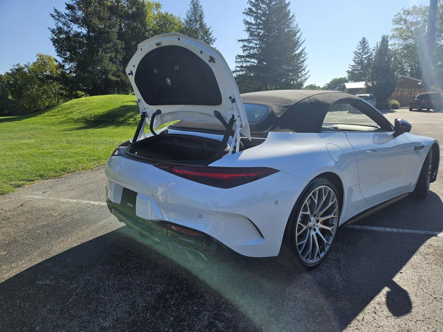 2023 White /Tan Mercedes-Benz SL-Class SL55 (W1KVK8AB5PF) with an 4.0L V8 engine, 9A transmission, located at 2510 47th St. Suite 200, Boulder, CO, 80301, (303) 641-0333, 40.026196, -105.243217 - This Beautiful One Owner, Super Low Mile, (8,215 mi.) SL-Class SL55 is a Recent acquisition by Boulder Motors in Boulder Colorado. It is finished in Mercedes MANUFAKTUR Moonlight White Metallic (885) with Sienna Brown / Black Nappa Leather Interior. It has a One Owner Clean CarFax and Autocheck sho- Photo#14