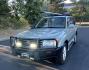 2003 Blue /Gray Toyota Land Cruiser 4WD (JTEHT05J932) with an 4.7L V8 DOHC 32V engine, 5A OD transmission, located at 2510 47th St. Suite 200, Boulder, CO, 80301, (303) 641-0333, 40.026196, -105.243217 - This Amazing, Toyota Serviced Land Cruiser is a Recent Acquisition by Boulder Motors of Boulder Colorado. Corwin Toyota Boulder Completed a Fresh Synthetic Service and Inspection 12/16/2025 At Our Listed Price This great 2003 Land Cruiser qualifies for our Certified Limited Drivetrain Warranty.- Photo#0