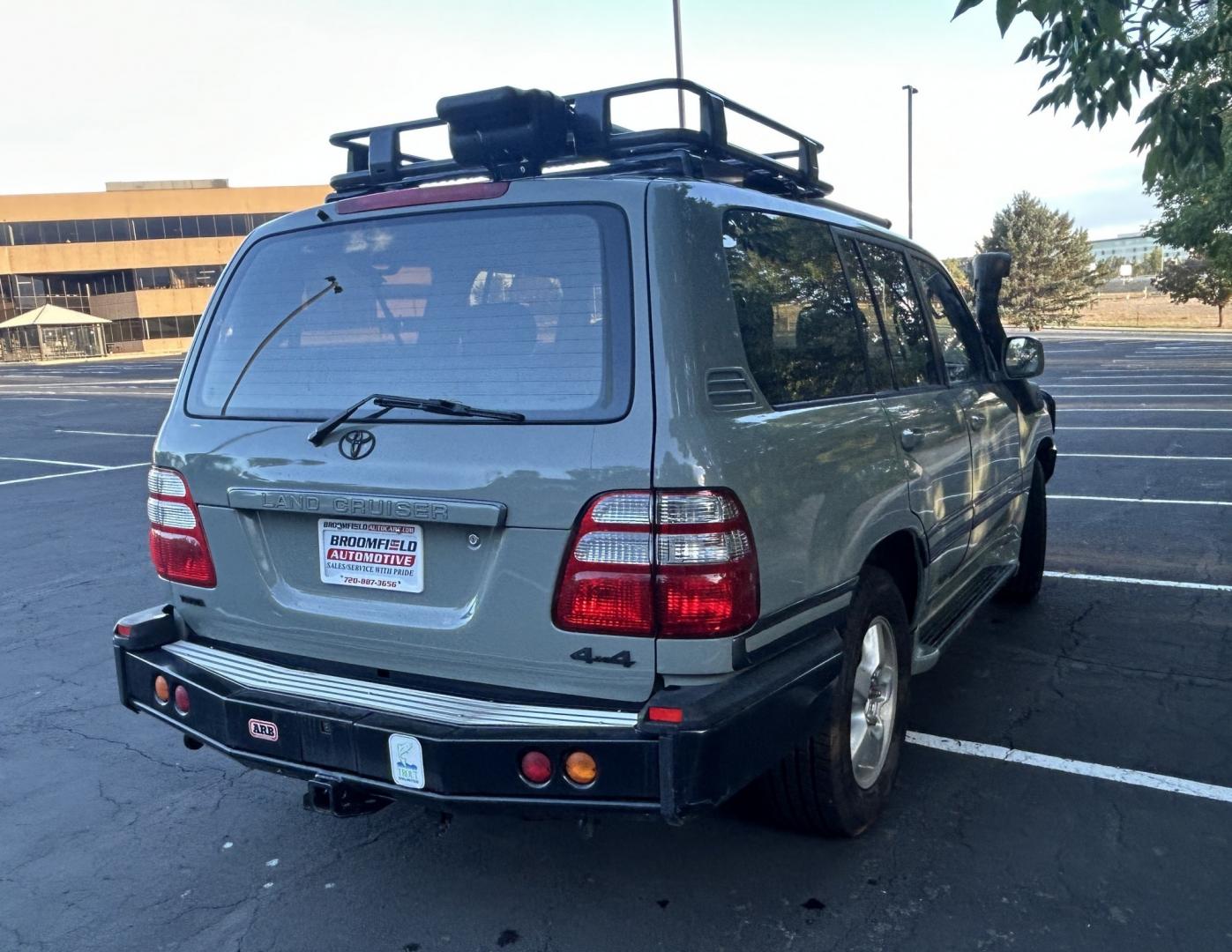 2003 Blue /Gray Toyota Land Cruiser 4WD (JTEHT05J932) with an 4.7L V8 DOHC 32V engine, 5A OD transmission, located at 2510 47th St. Suite 200, Boulder, CO, 80301, (303) 641-0333, 40.026196, -105.243217 - This Amazing, Toyota Serviced Land Cruiser is a Recent Acquisition by Boulder Motors of Boulder Colorado. Corwin Toyota Boulder Completed a Fresh Synthetic Service and Inspection 12/16/2025 At Our Listed Price This great 2003 Land Cruiser qualifies for our Certified Limited Drivetrain Warranty.- Photo#3