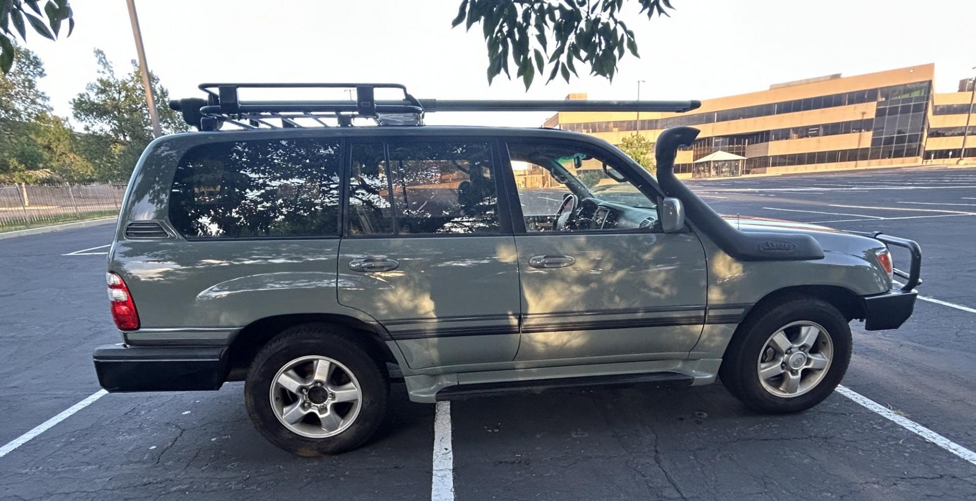 2003 Blue /Gray Toyota Land Cruiser 4WD (JTEHT05J932) with an 4.7L V8 DOHC 32V engine, 5A OD transmission, located at 2510 47th St. Suite 200, Boulder, CO, 80301, (303) 641-0333, 40.026196, -105.243217 - This Amazing, Toyota Serviced Land Cruiser is a Recent Acquisition by Boulder Motors of Boulder Colorado. Corwin Toyota Boulder Completed a Fresh Synthetic Service and Inspection 12/16/2025 At Our Listed Price This great 2003 Land Cruiser qualifies for our Certified Limited Drivetrain Warranty.- Photo#4