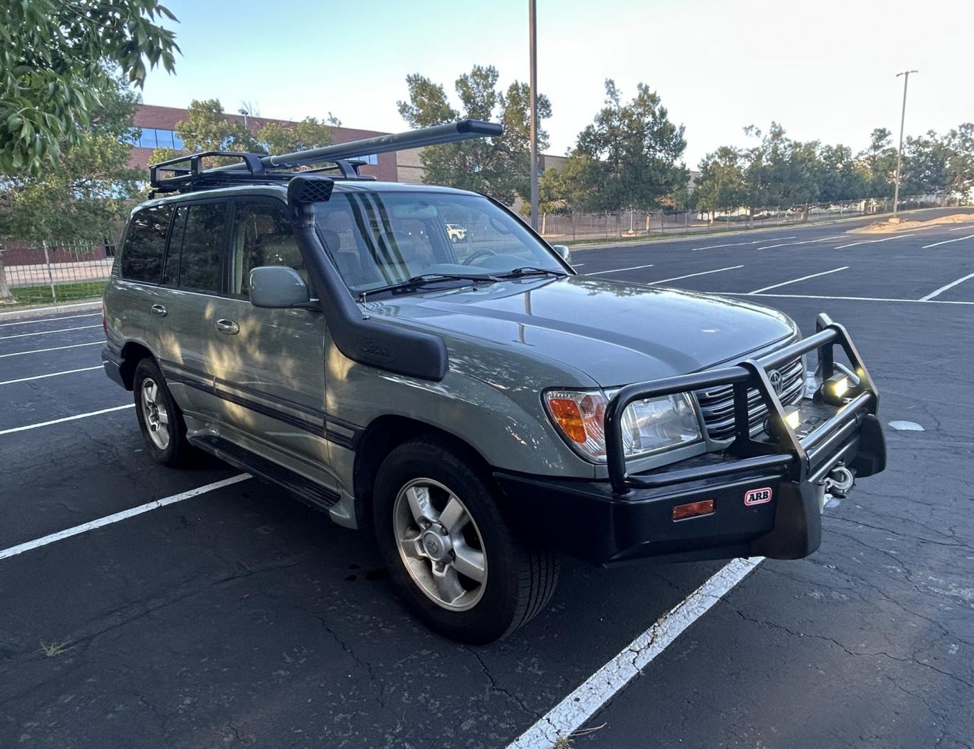 2003 Blue /Gray Toyota Land Cruiser 4WD (JTEHT05J932) with an 4.7L V8 DOHC 32V engine, 5A OD transmission, located at 2510 47th St. Suite 200, Boulder, CO, 80301, (303) 641-0333, 40.026196, -105.243217 - This Amazing, Toyota Serviced Land Cruiser is a Recent Acquisition by Boulder Motors of Boulder Colorado. Corwin Toyota Boulder Completed a Fresh Synthetic Service and Inspection 12/16/2025 At Our Listed Price This great 2003 Land Cruiser qualifies for our Certified Limited Drivetrain Warranty.- Photo#5