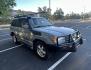 2003 Blue /Gray Toyota Land Cruiser 4WD (JTEHT05J932) with an 4.7L V8 DOHC 32V engine, 5A OD transmission, located at 2510 47th St. Suite 200, Boulder, CO, 80301, (303) 641-0333, 40.026196, -105.243217 - This Amazing, Toyota Serviced Land Cruiser is a Recent Acquisition by Boulder Motors of Boulder Colorado. Corwin Toyota Boulder Completed a Fresh Synthetic Service and Inspection 12/16/2025 At Our Listed Price This great 2003 Land Cruiser qualifies for our Certified Limited Drivetrain Warranty.- Photo#5