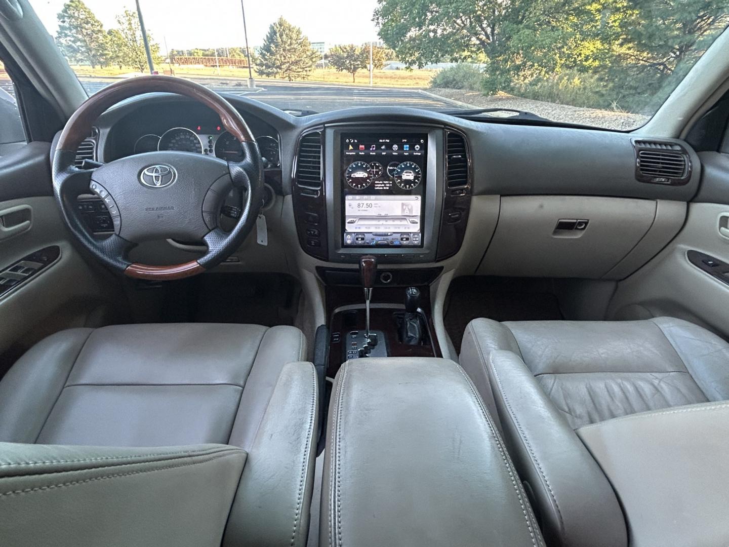 2003 Blue /Gray Toyota Land Cruiser 4WD (JTEHT05J932) with an 4.7L V8 DOHC 32V engine, 5A OD transmission, located at 2510 47th St. Suite 200, Boulder, CO, 80301, (303) 641-0333, 40.026196, -105.243217 - This Amazing, Toyota Serviced Land Cruiser is a Recent Acquisition by Boulder Motors of Boulder Colorado. Corwin Toyota Boulder Completed a Fresh Synthetic Service and Inspection 12/16/2025 At Our Listed Price This great 2003 Land Cruiser qualifies for our Certified Limited Drivetrain Warranty.- Photo#10