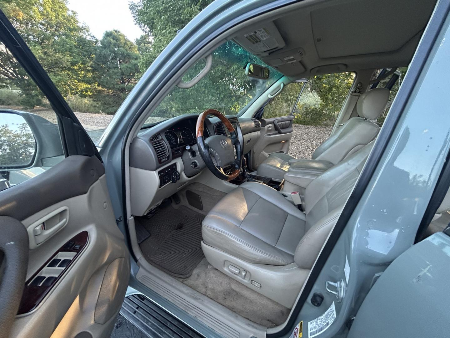 2003 Blue /Gray Toyota Land Cruiser 4WD (JTEHT05J932) with an 4.7L V8 DOHC 32V engine, 5A OD transmission, located at 2510 47th St. Suite 200, Boulder, CO, 80301, (303) 641-0333, 40.026196, -105.243217 - This Amazing, Toyota Serviced Land Cruiser is a Recent Acquisition by Boulder Motors of Boulder Colorado. Corwin Toyota Boulder Completed a Fresh Synthetic Service and Inspection 12/16/2025 At Our Listed Price This great 2003 Land Cruiser qualifies for our Certified Limited Drivetrain Warranty.- Photo#11