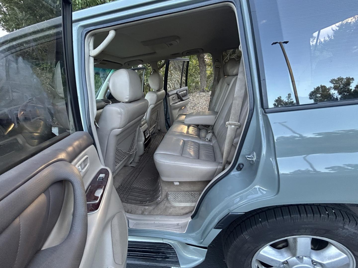 2003 Blue /Gray Toyota Land Cruiser 4WD (JTEHT05J932) with an 4.7L V8 DOHC 32V engine, 5A OD transmission, located at 2510 47th St. Suite 200, Boulder, CO, 80301, (303) 641-0333, 40.026196, -105.243217 - This Amazing, Toyota Serviced Land Cruiser is a Recent Acquisition by Boulder Motors of Boulder Colorado. Corwin Toyota Boulder Completed a Fresh Synthetic Service and Inspection 12/16/2025 At Our Listed Price This great 2003 Land Cruiser qualifies for our Certified Limited Drivetrain Warranty.- Photo#13